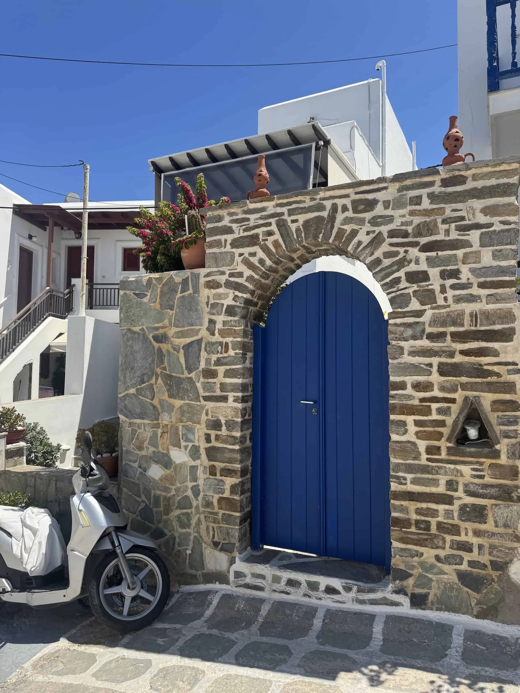 Stone Archway and Blue Door in Naoussa