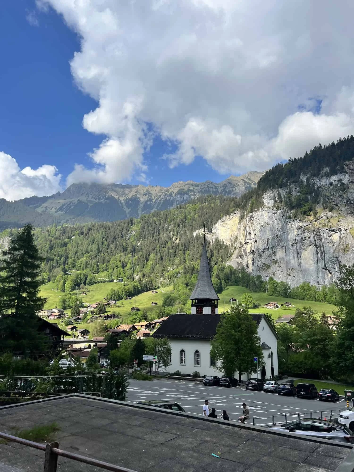 Iconic Lauterbrunnen Church Under Alpine Cliffs