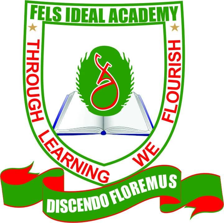 Emblem of Fels Ideal Academy with green and red colors featuring a book, a green feather, and the motto "Discendo Floremus" on a banner.