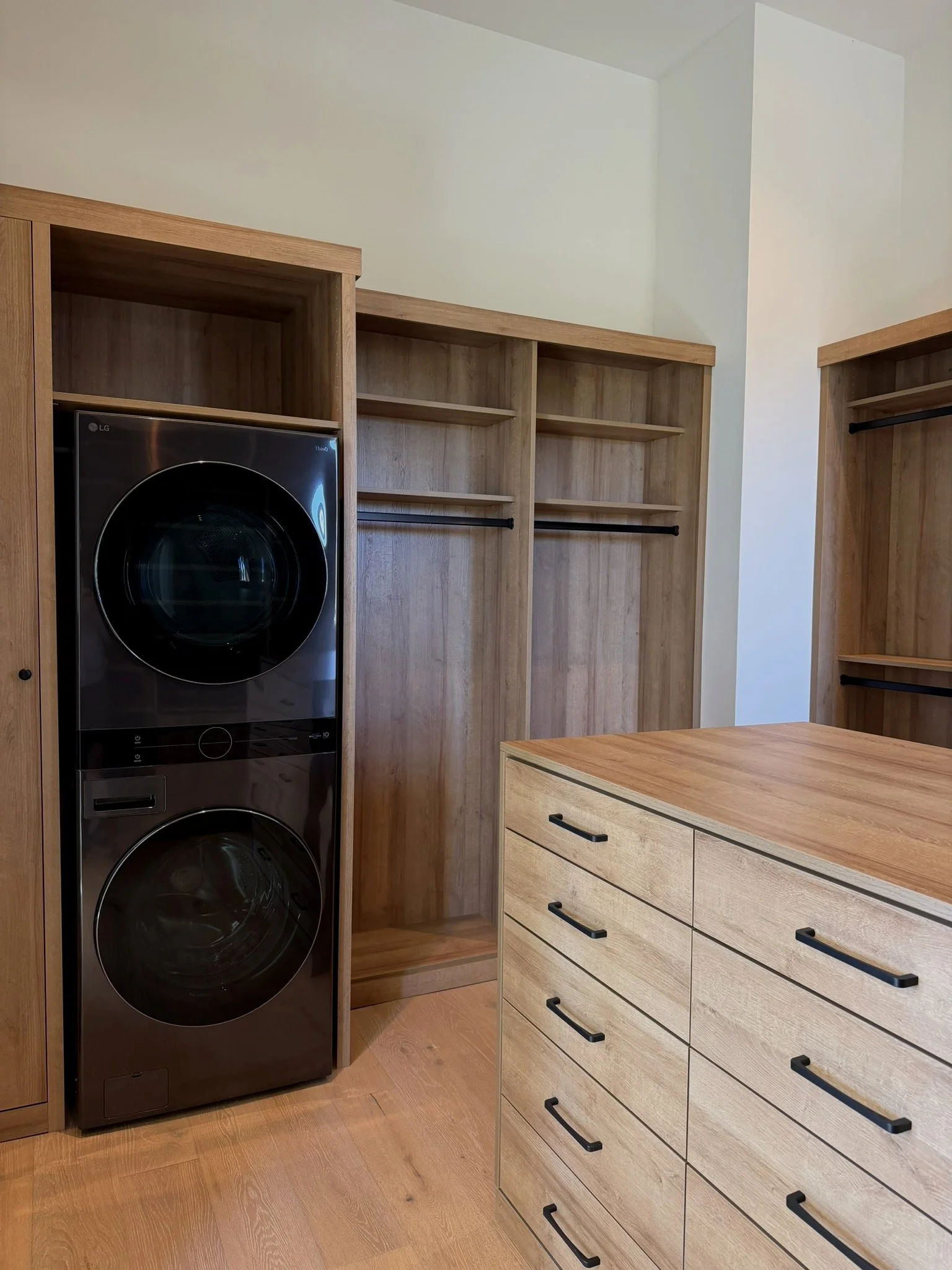 Master closet, built in laundry, long hangs, 10 drawer island, wood top