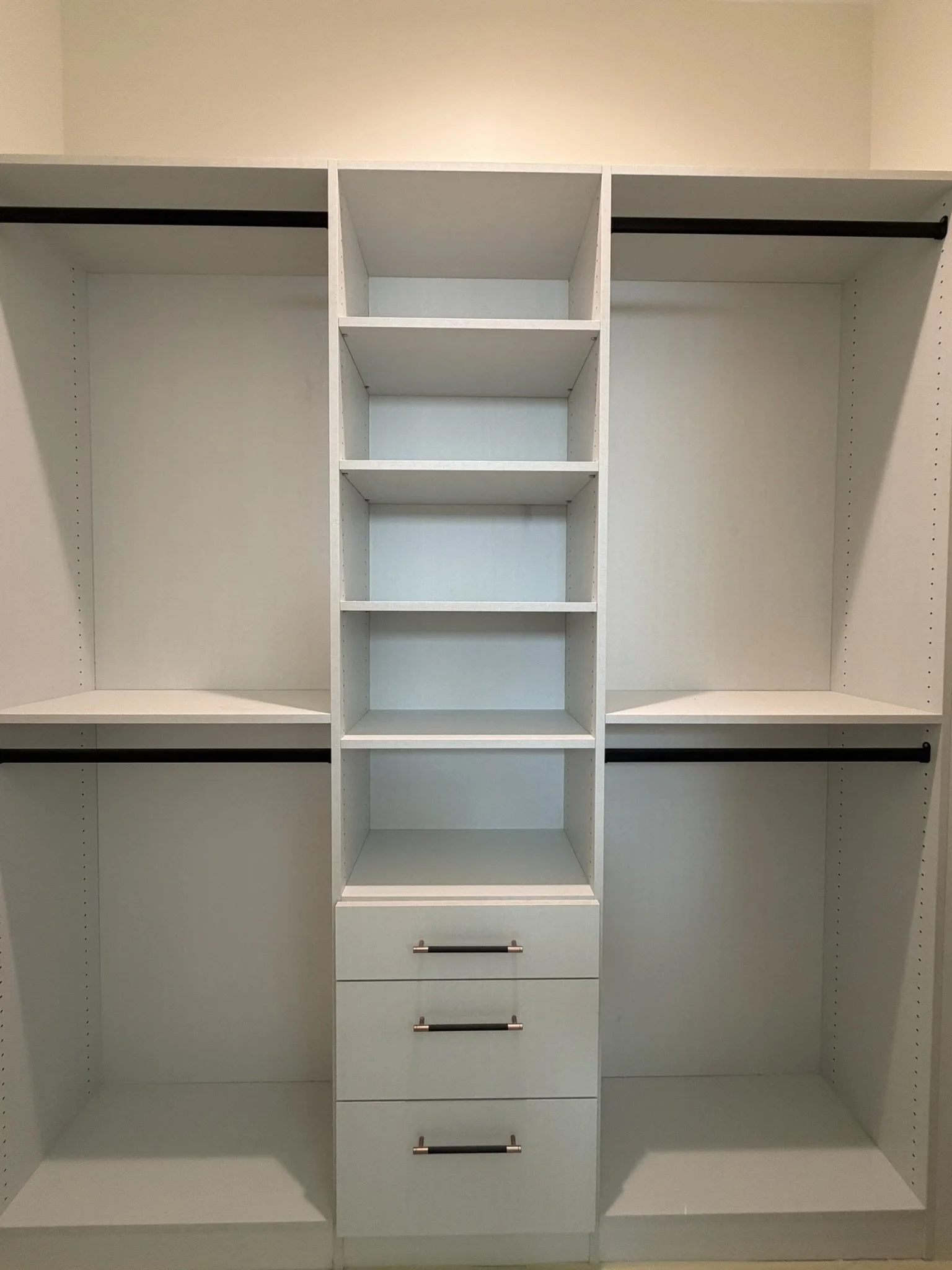 Guest closet, reach in, black hardware, black pulls, white textured linen