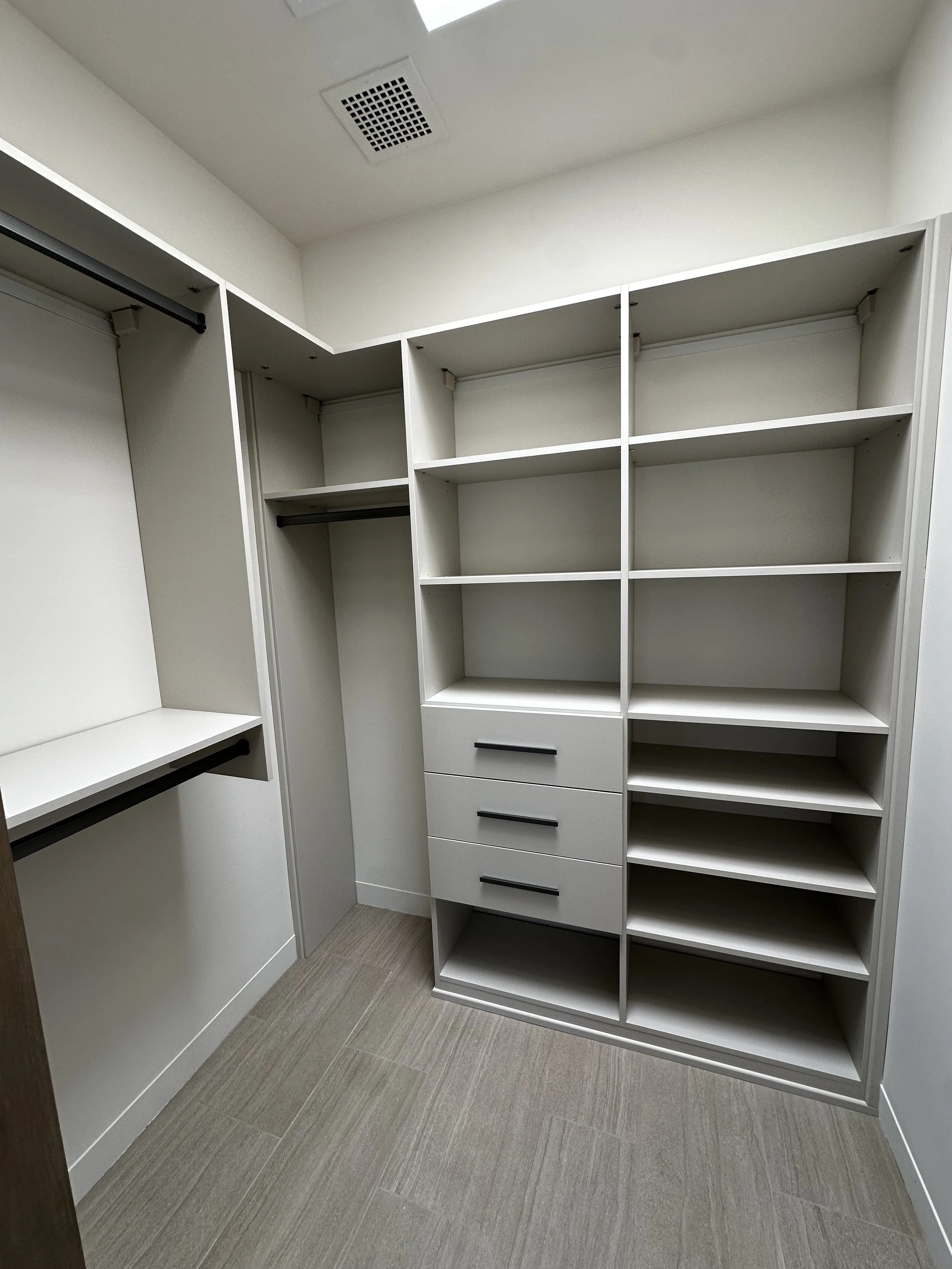 Guest closet, black tag hardware, Tafisa super matte finish