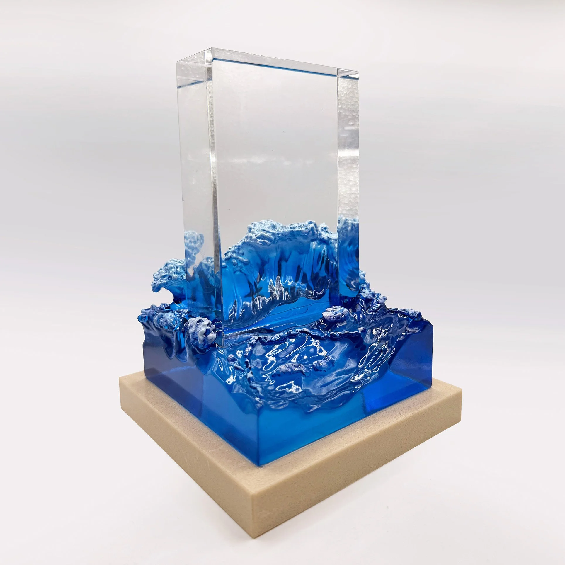 Custom blue sculptural wave deal toy by Polaris Custom Awards