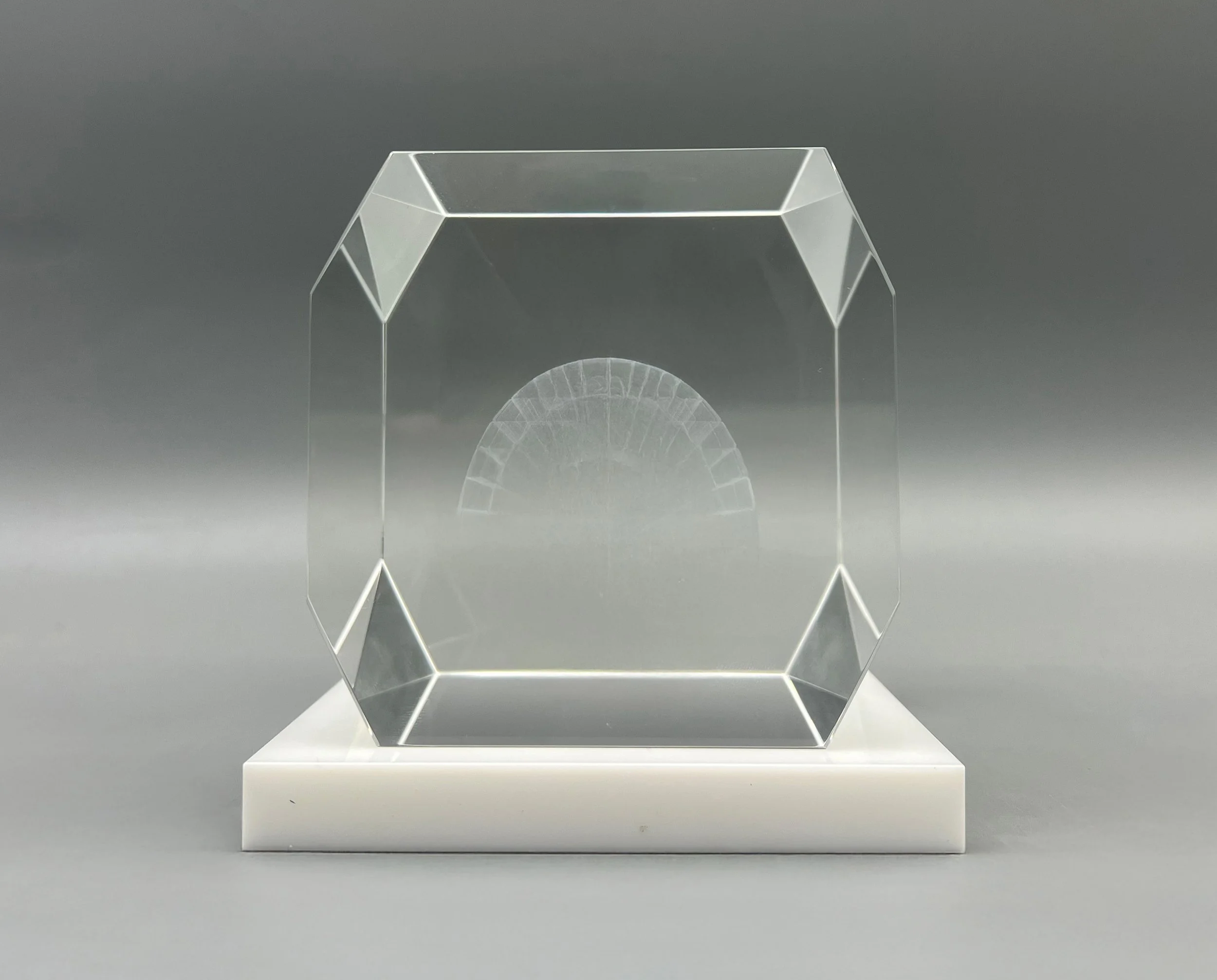 Custom crystal faceted deal toy with 3D laser etch by Polaris Custom Awards.