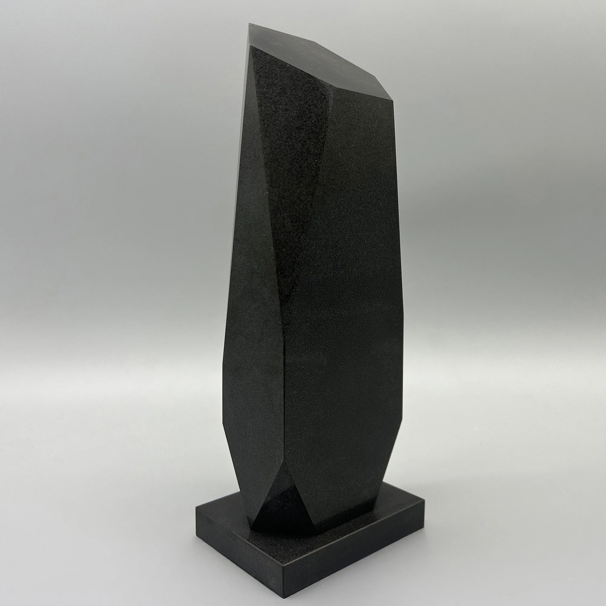 Custom black crystal faceted column deal toy by Polaris Custom Awards.