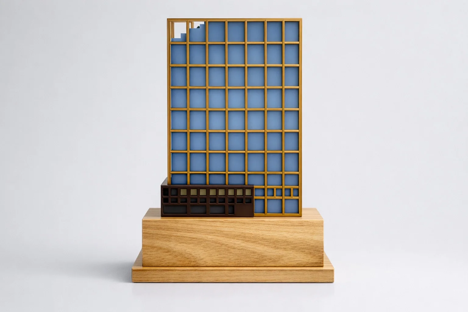 Custom architectural real estate deal toy model of a mass timber building on wood base.