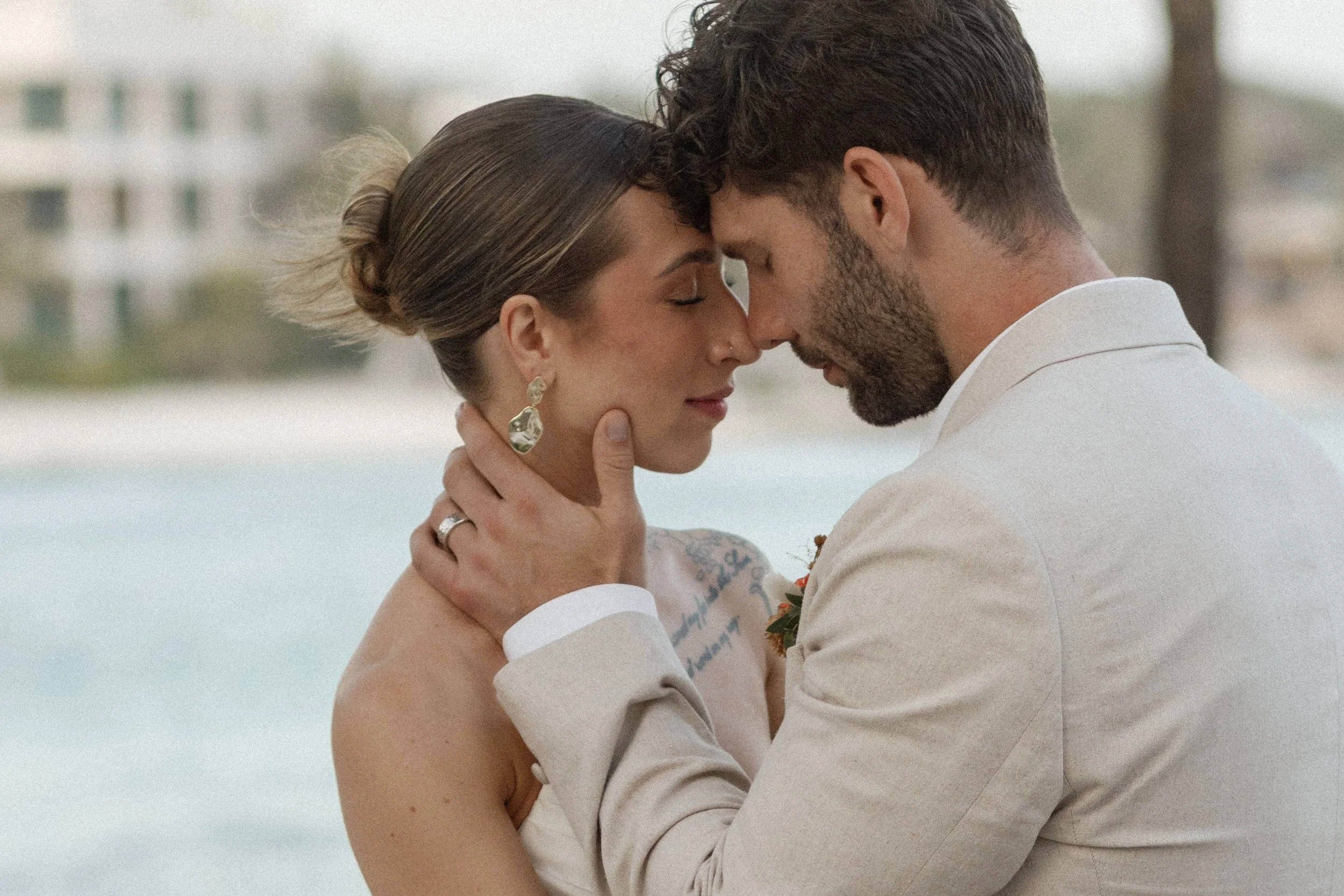 Romantic detail of the bride and the groom, the close up shows the love for eachother.