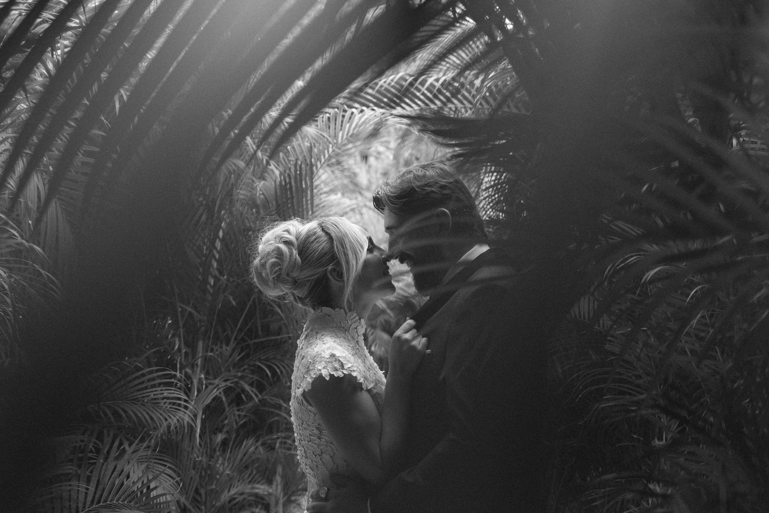 Shades of Black and white with bride and groom getting married at Tulum beach
