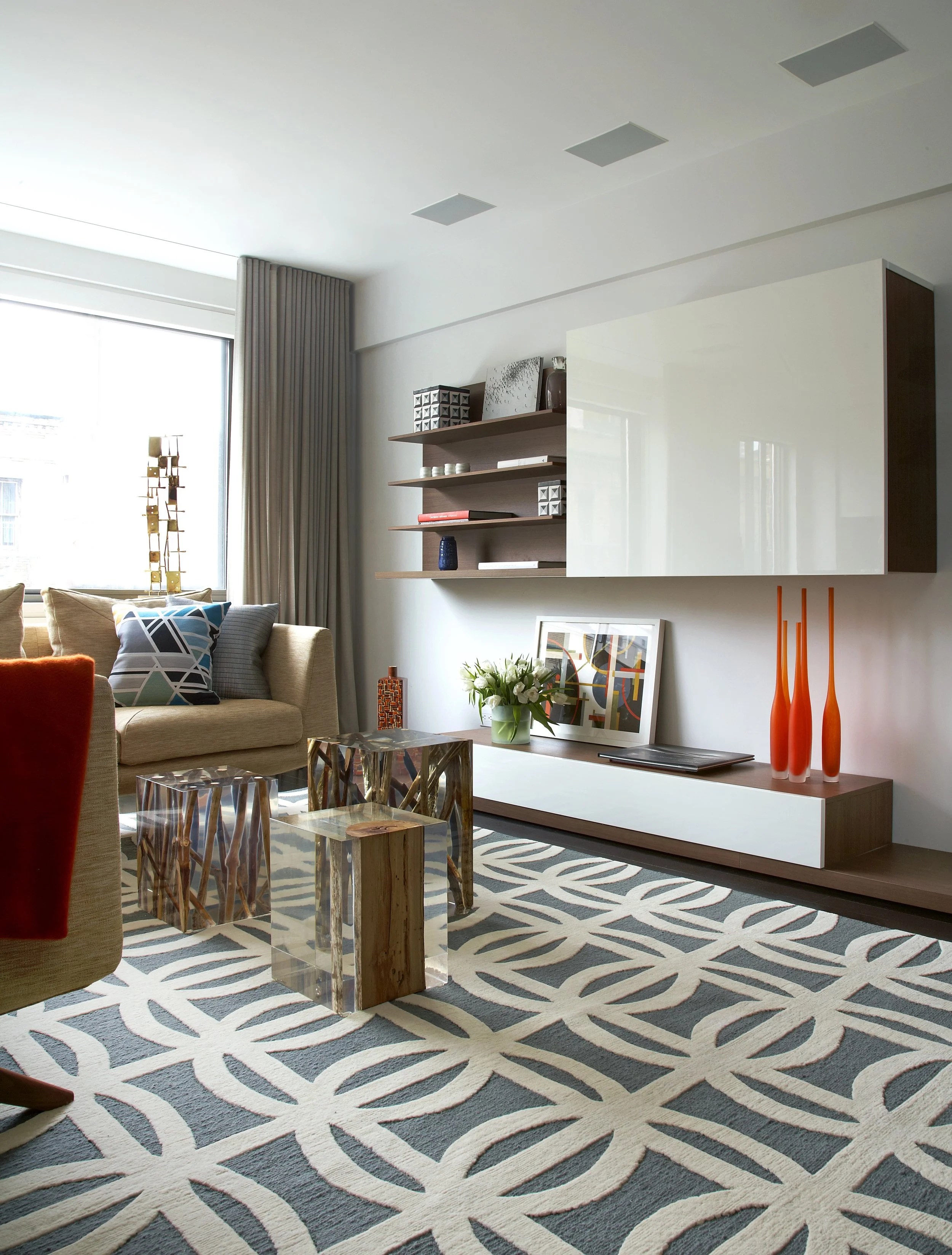 mid century living room with hidden tv interior design nyc