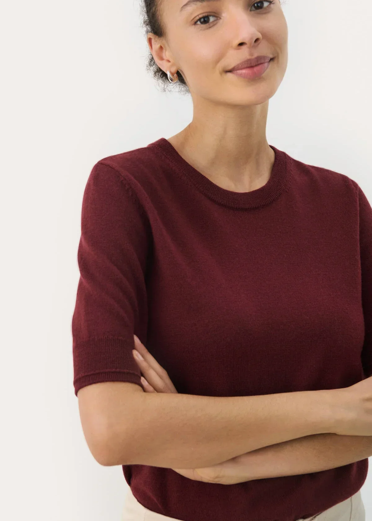 Maroon_short-sleeve_knit_top_with_a_round_neckline_350_1440x_c2c0ad2e-4b36-4eb0-a8d7-41e297746ec1.webp