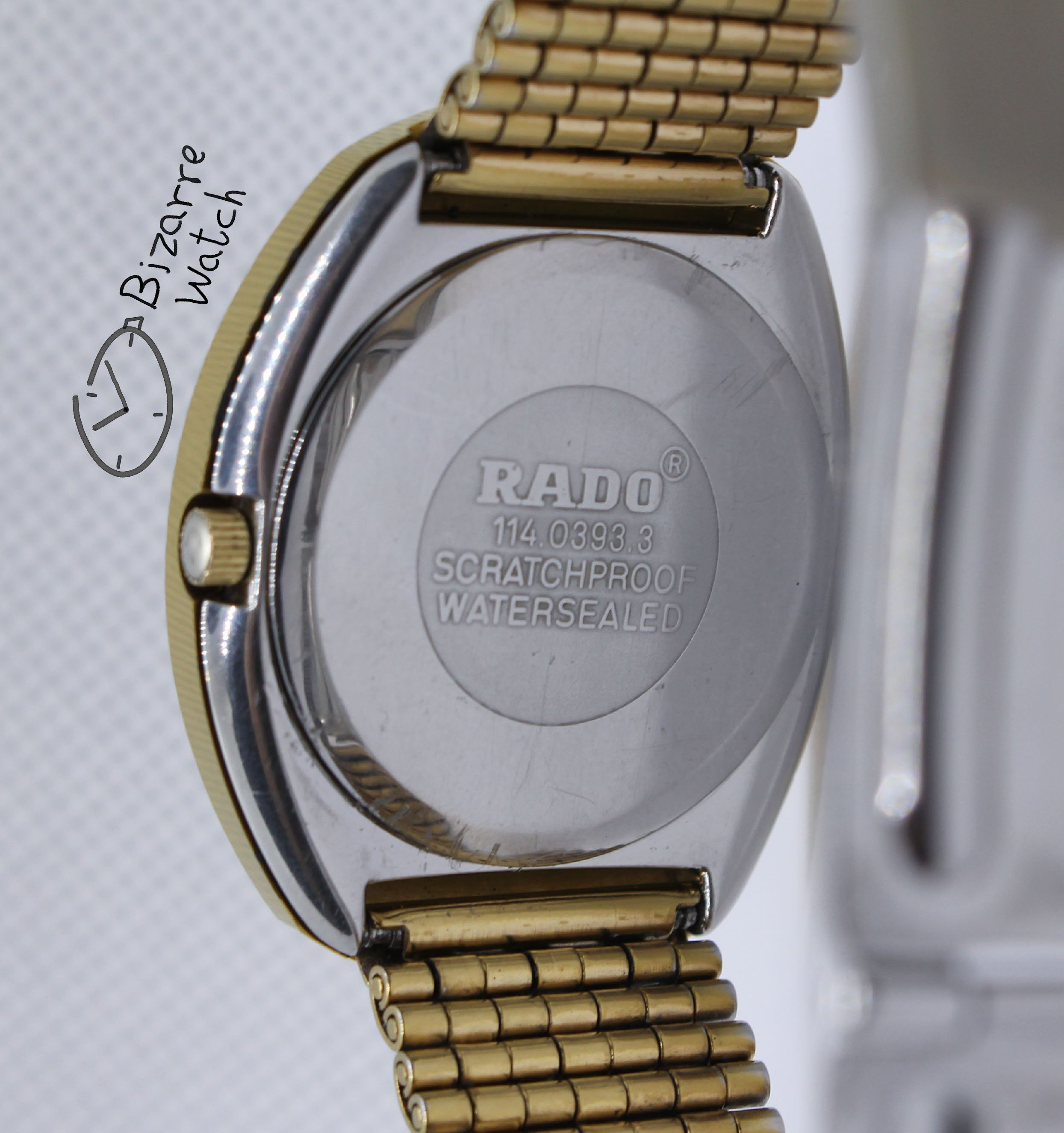 caseback gold RADO The Original Diastar Scratchproof 114.0393.3 Day Date 36mm Goldplated Watch bizarrewatch bizarre men unisex women