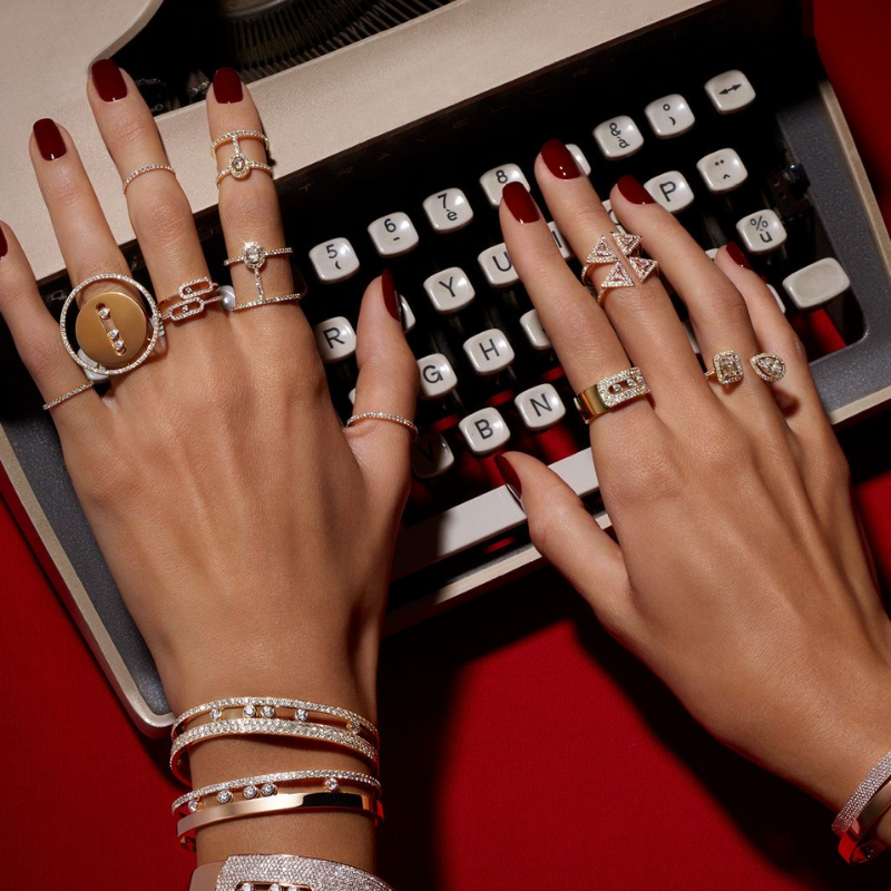 Clean, modern workspace showing a laptop with a website layout on screen, representing building a professional digital home for a makeup artist.