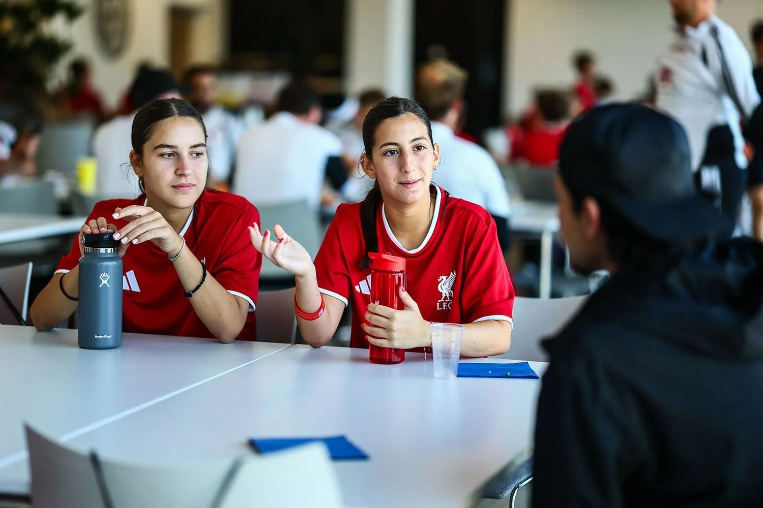 Girls sitting at lunch on camp