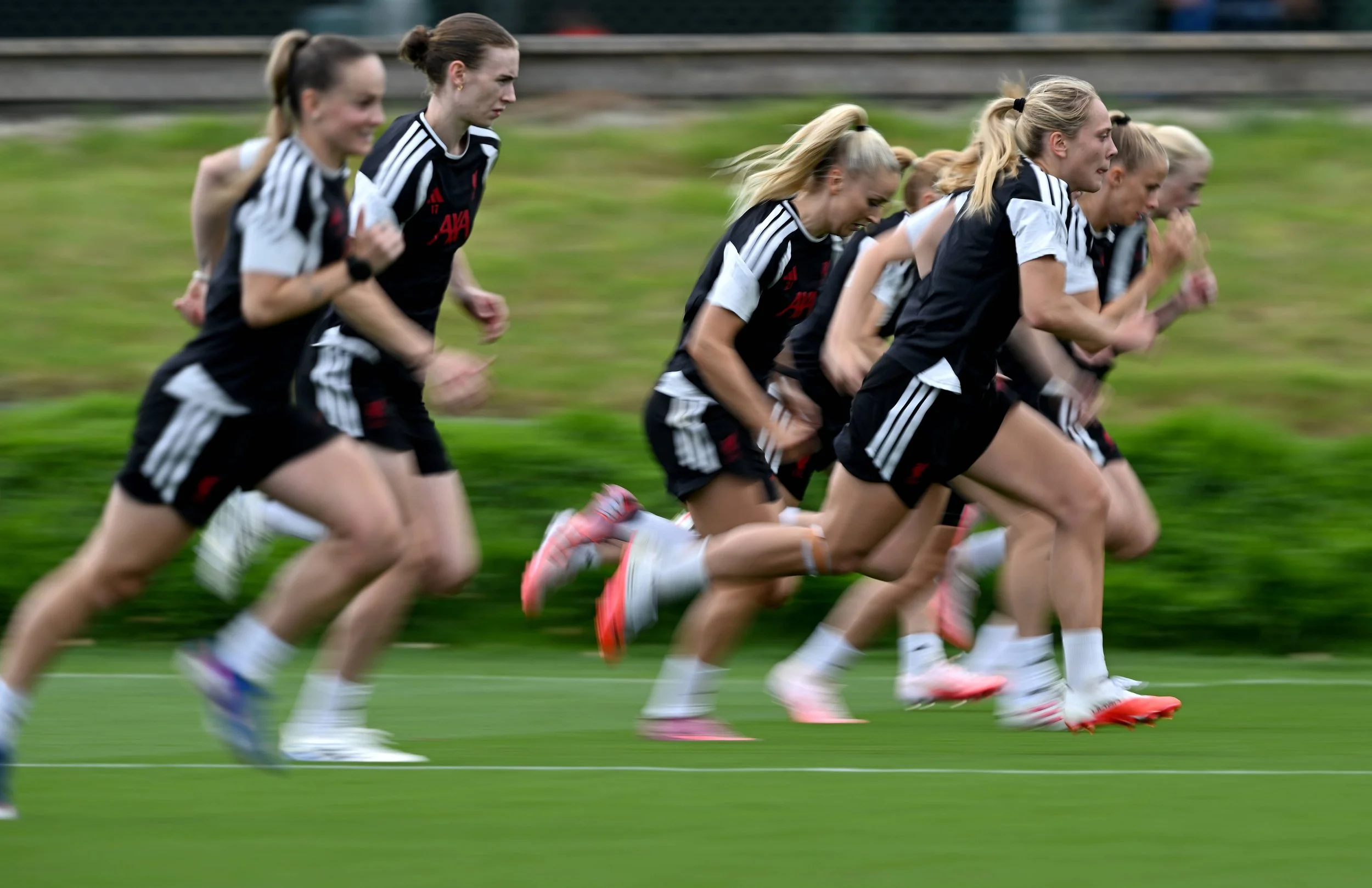 Liverpool Womens team sprinting