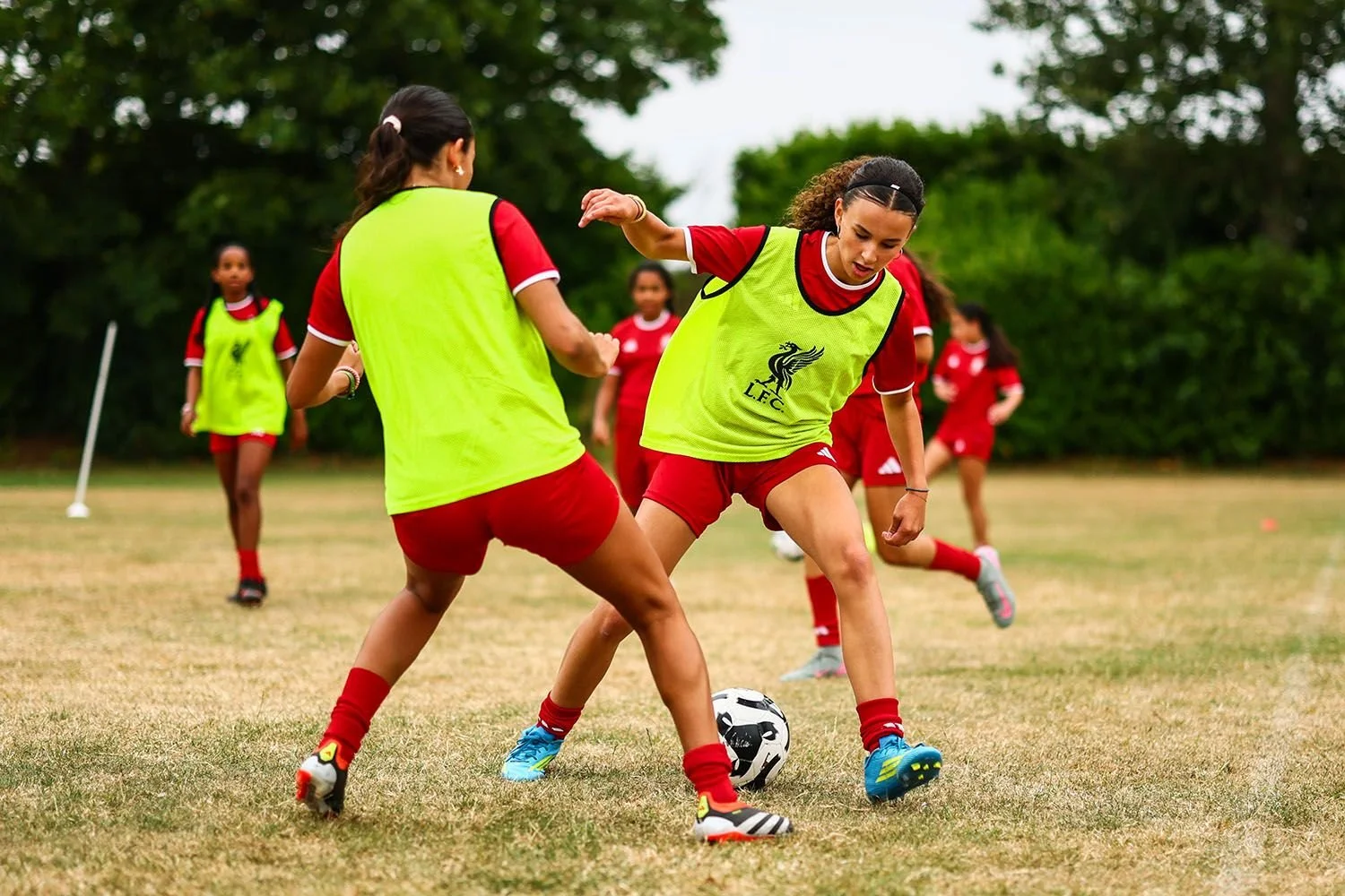 Girls on LFC camp training on the pitch