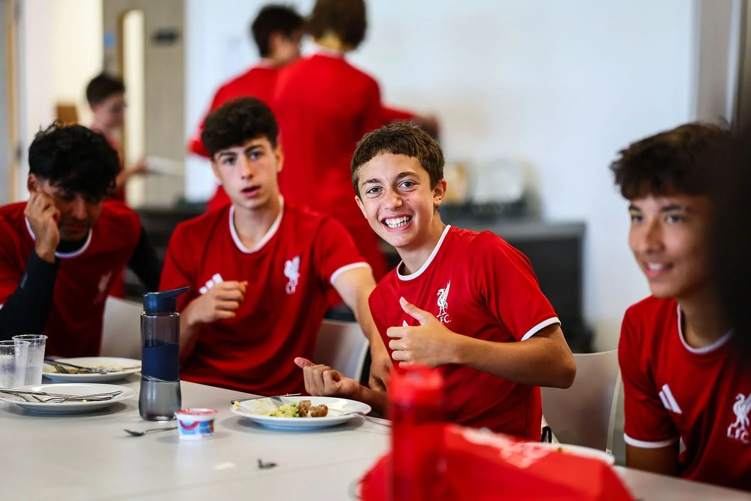 LFC players smiling in lunch