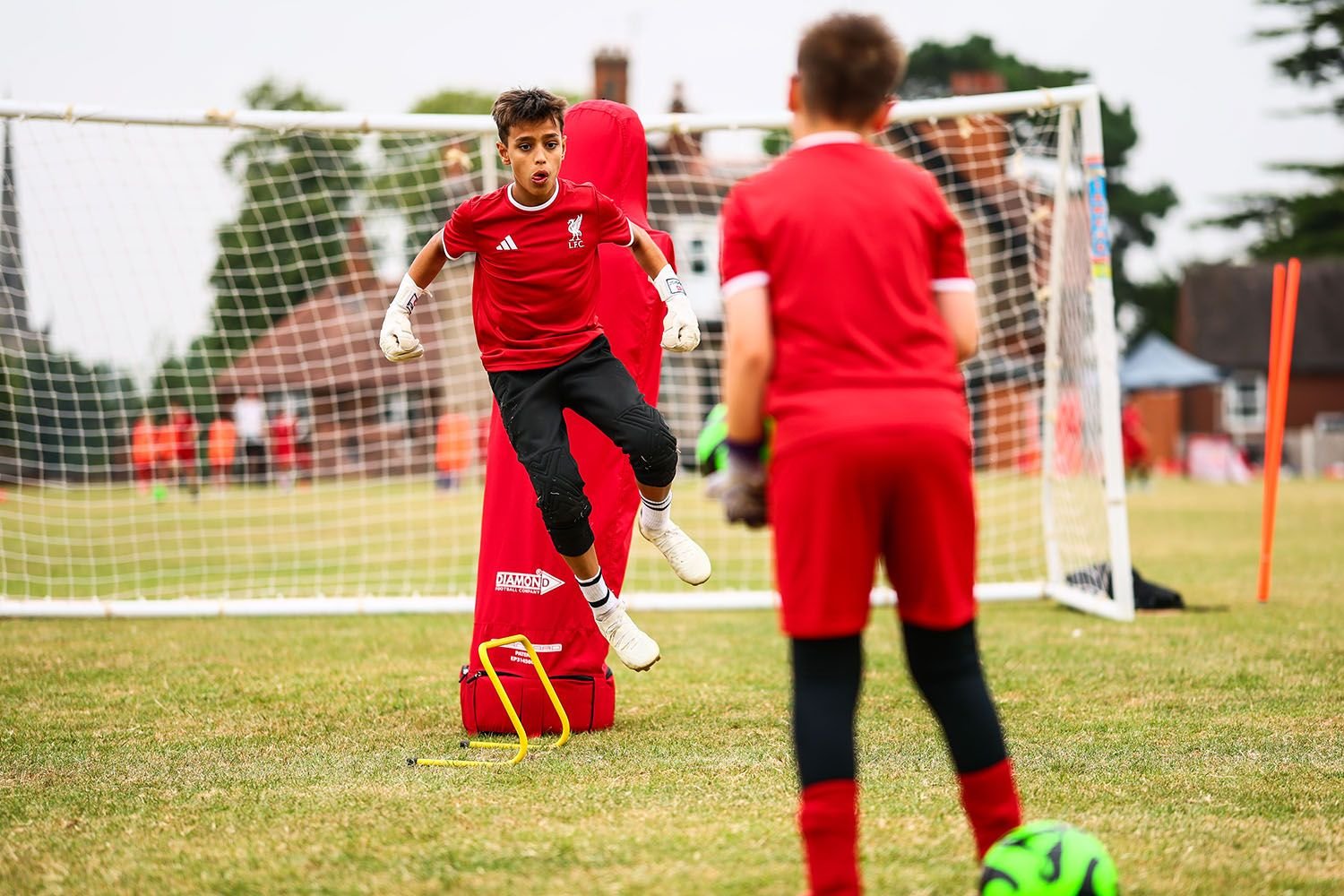 Goalkeeper training in Liverpool kit