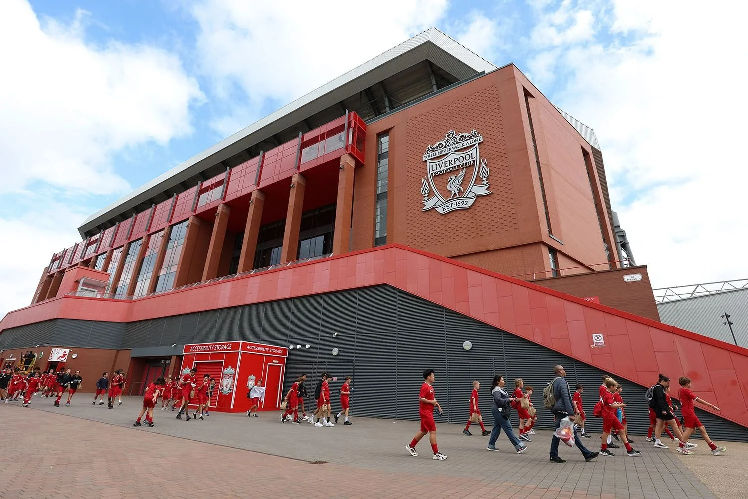 Players on tour at Anfield stadium
