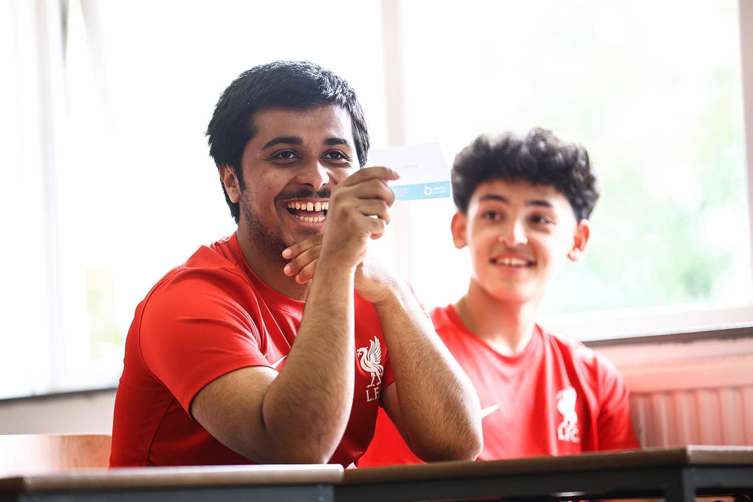 Player laughing in LFC workshop