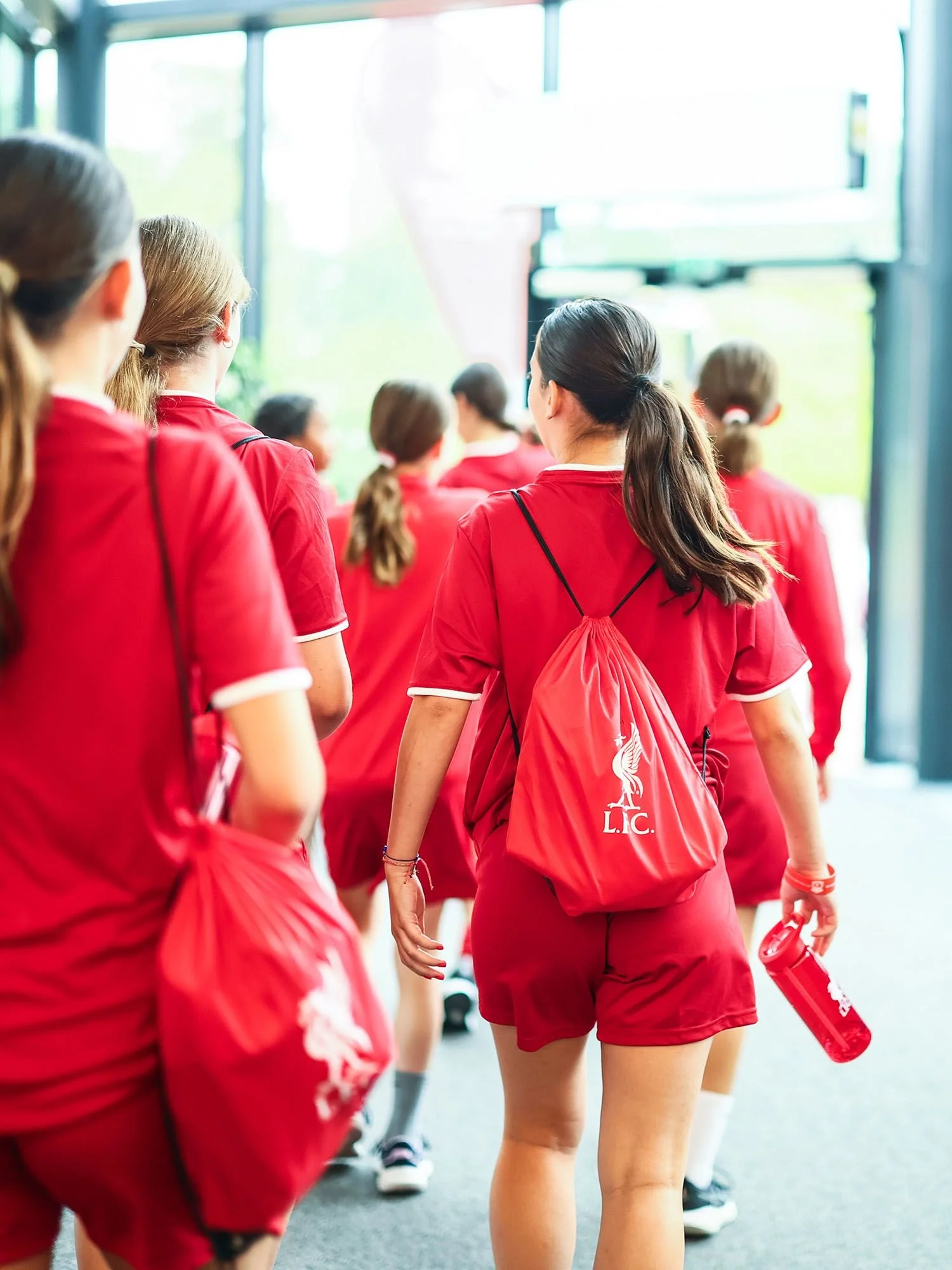 Girls walking to training