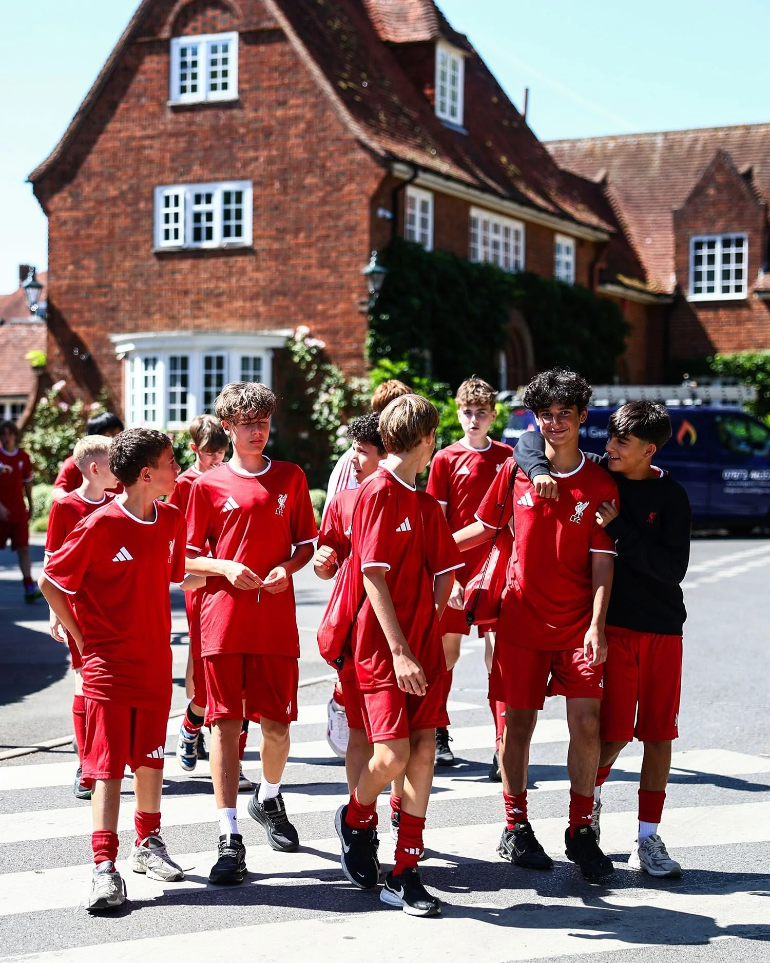Boys on football camp walking