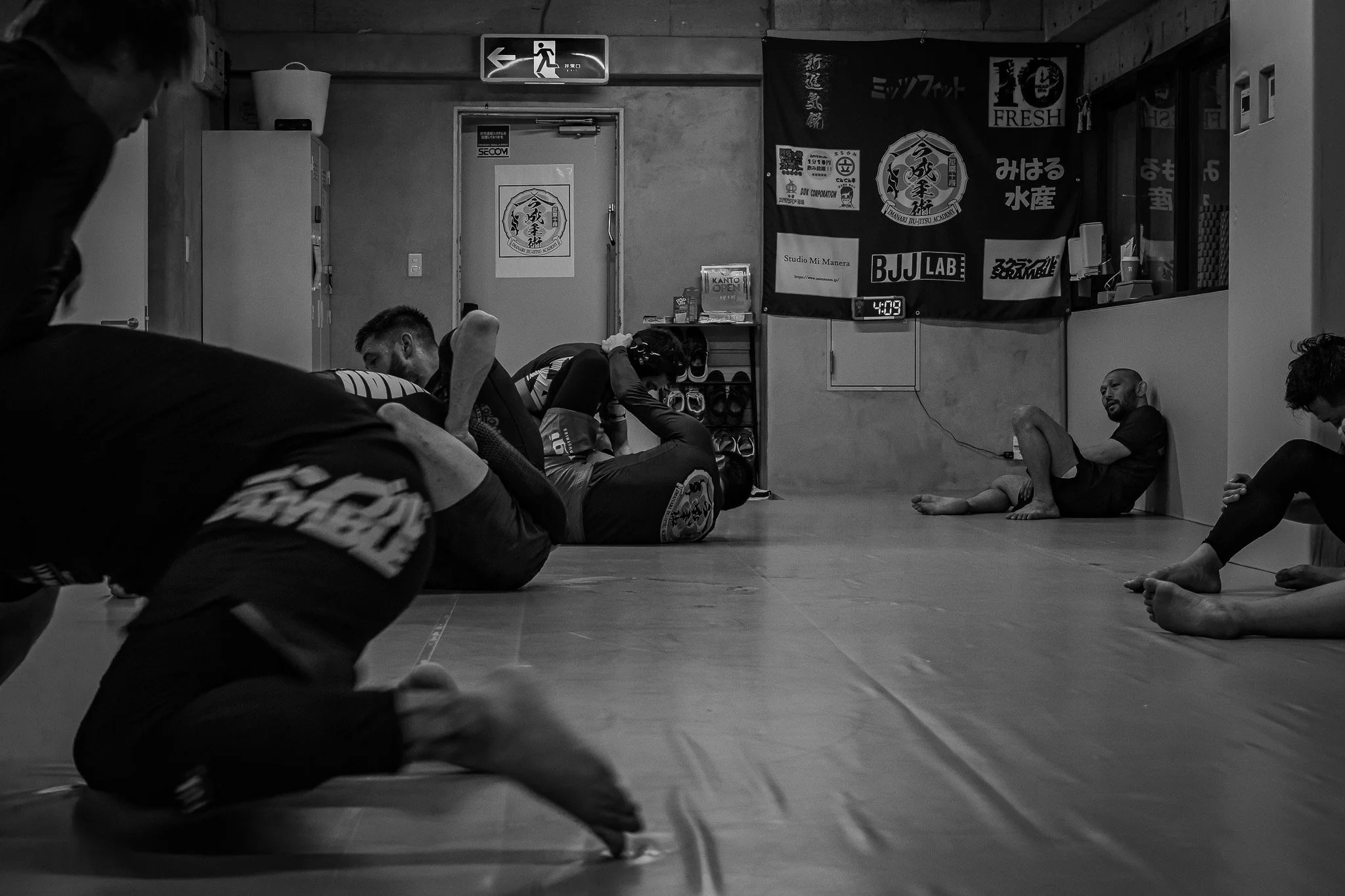 Wide view of live no-gi training at Imanari Jiu-Jitsu in Tokyo, Japan