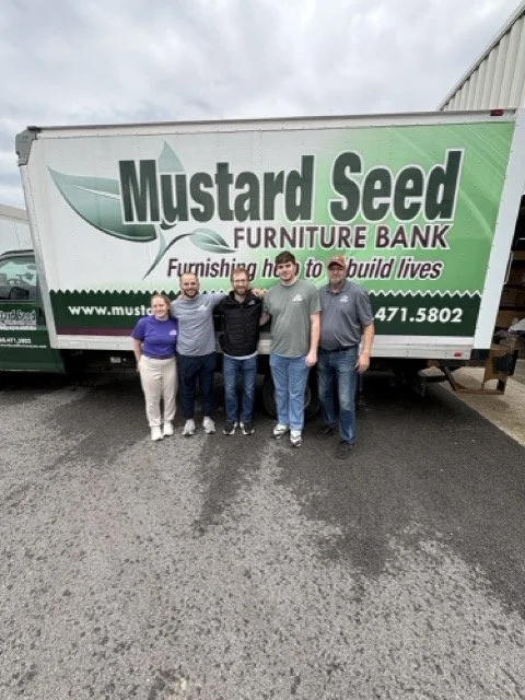 Quimby Village Clinic Volunteers at Mustard Seed Furniture Bank For IPT Community Day of Service 2026