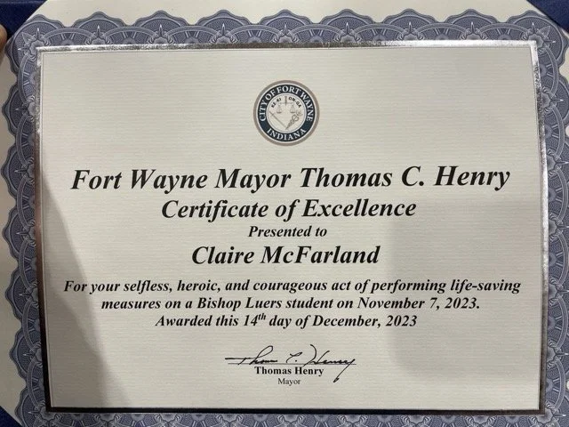 Photo of Fort Wayne Certificate of Excellence awarded to Claire McFarland