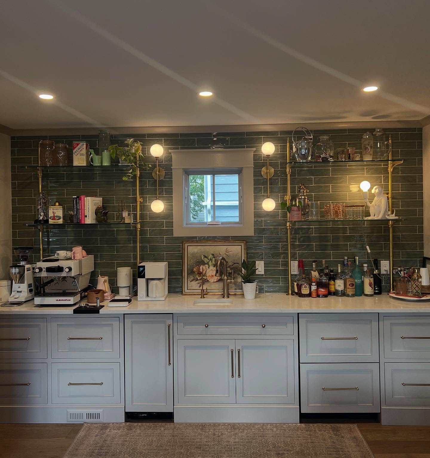 Today we&rsquo;re sharing the bar area. Some of the highlights are the solid brass french shelving, our epic coffee setup, the hidden ice maker, and hidden two drawer refrigerator. Also, all of my weird trinkets and plants. I may have posted this bef