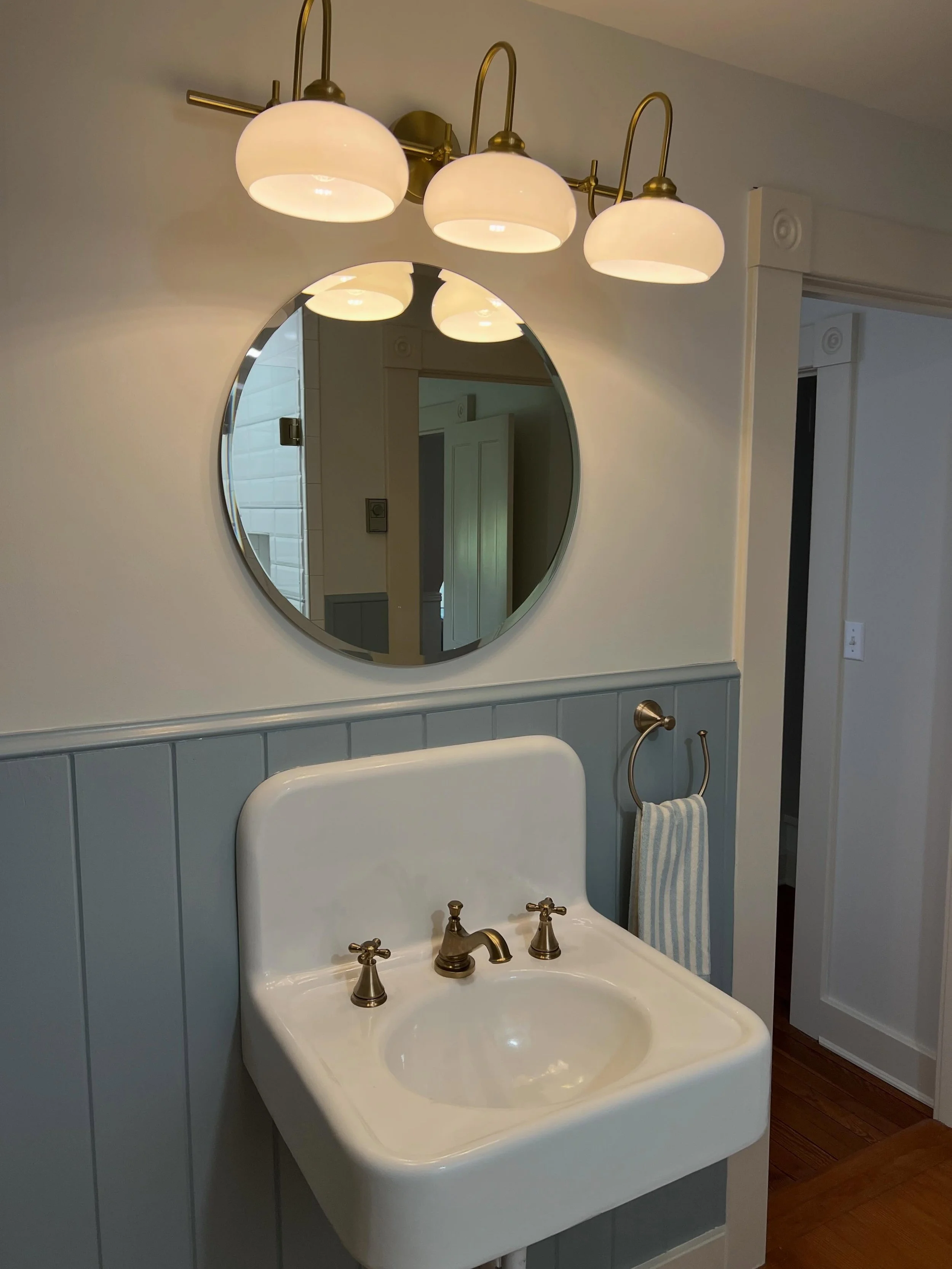 We&rsquo;re close to wrapping up a whole home refresh on a 120ish year old Victorian farmhouse including three bathrooms. This is one. We had the original sink refinished, new paneling installed, new shower, lighting, and plumbing. A lot went in to t