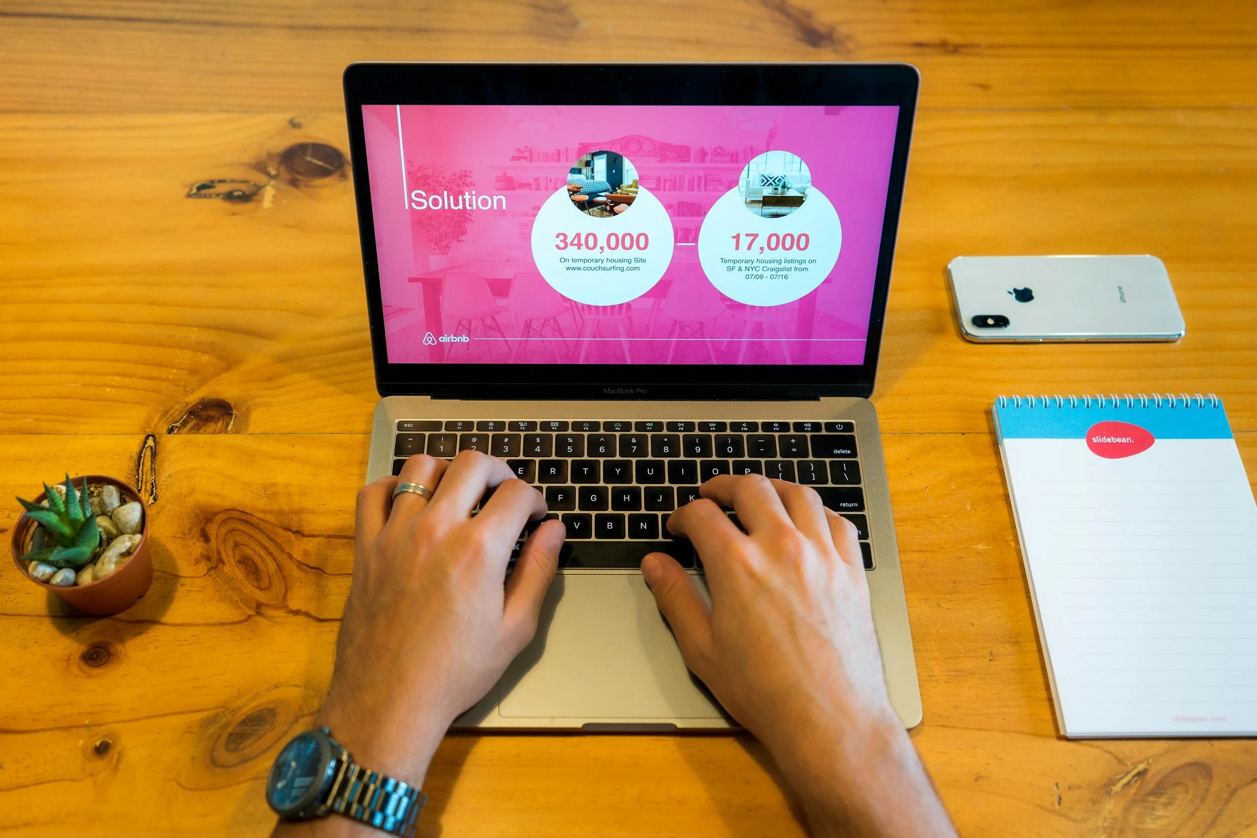 Image of a nonprofit fundraiser putting together a pitch deck gift chart to lead them through investment-level conversations and relationships with donors.