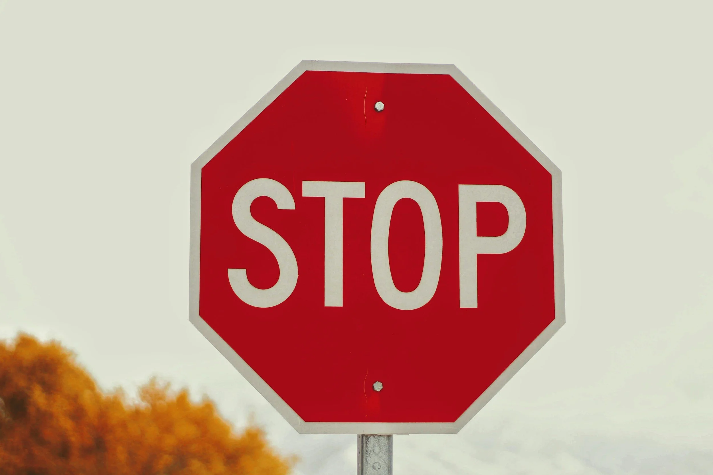 Image of a stop sign representing that  in nonprofit fundraising, starting something is easy but stopping something is hard.