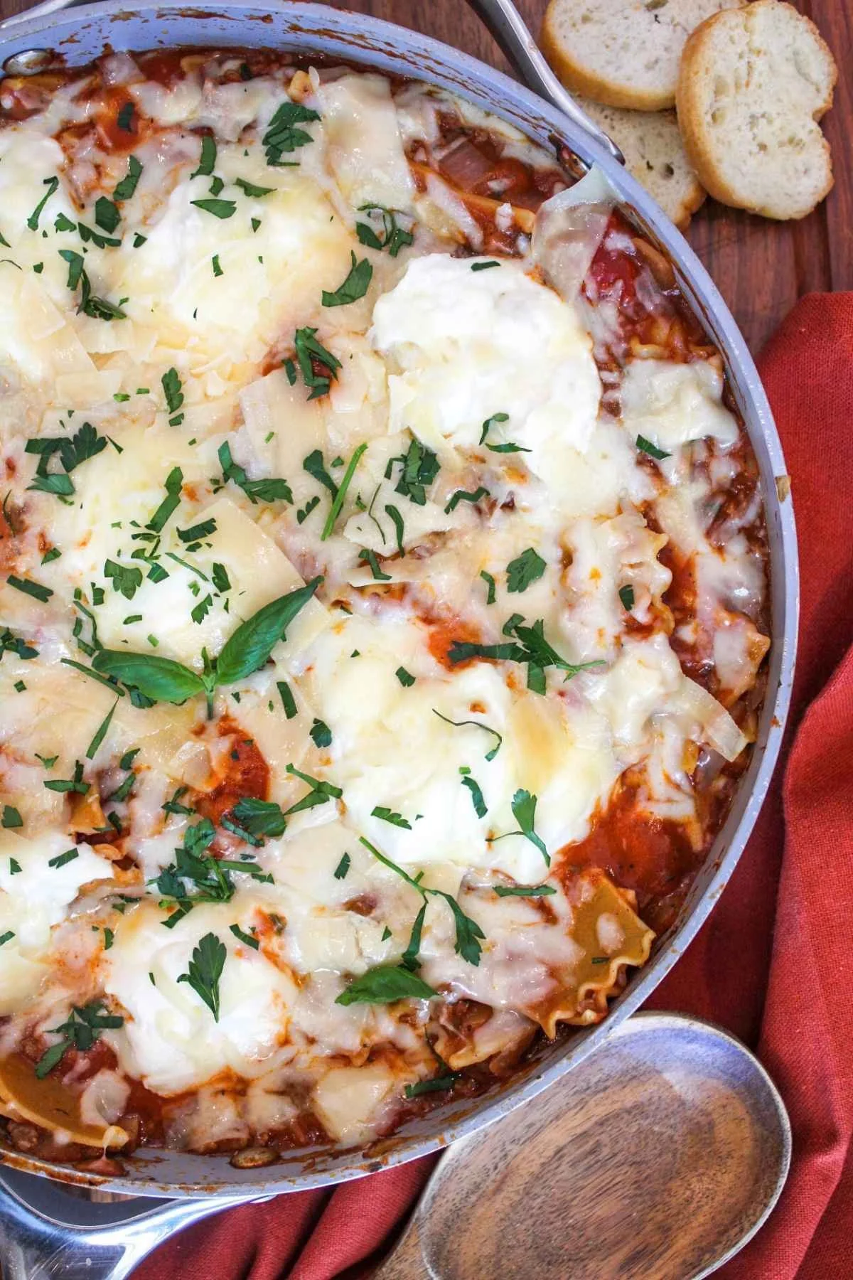 fresh basil leaves on top of the melted cheese layer for one pot lasagna.