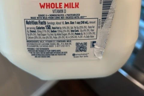 Whole non homogenized milk food label example depicting the words homogenized and pasteurized next to one another.