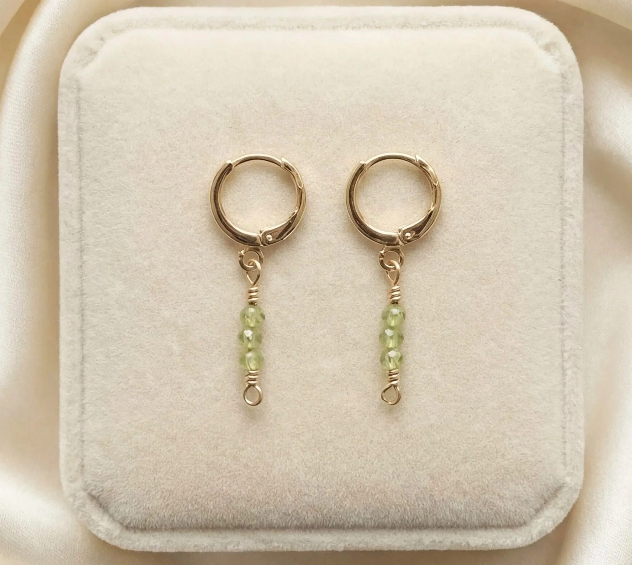 The Dainty Peridot Huggie Hoop Earrings - Gold