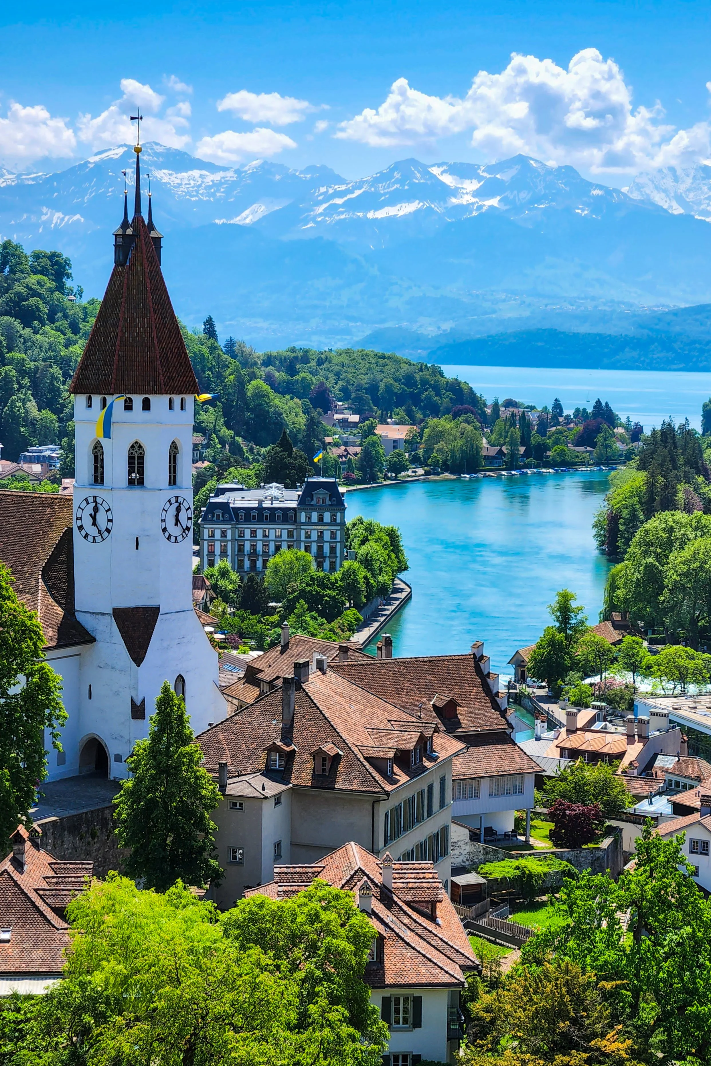 Ukrainian flag on church in Thun, Switzerland. May, 2022—3 months after Russian invasion of Ukraine