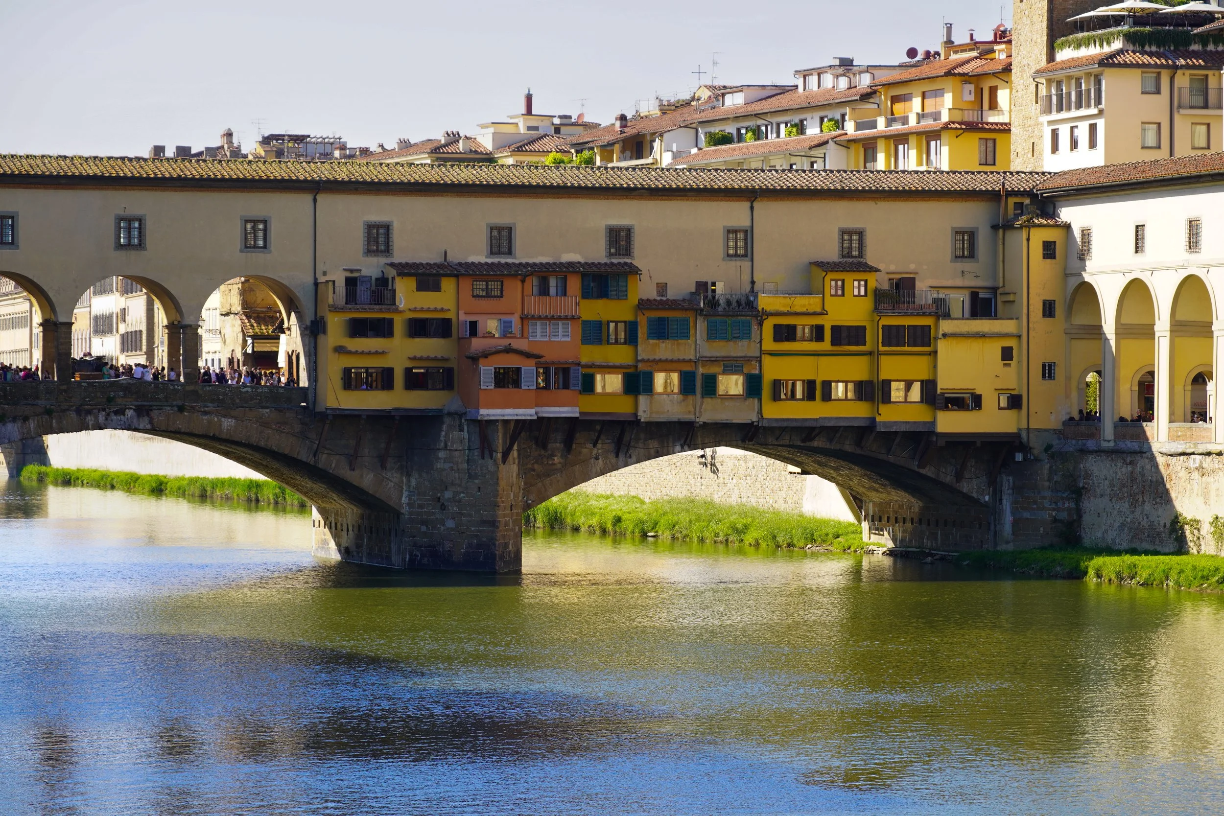 Shops along the Ponte Vecchio, over the Arno River in Florence, Italy
