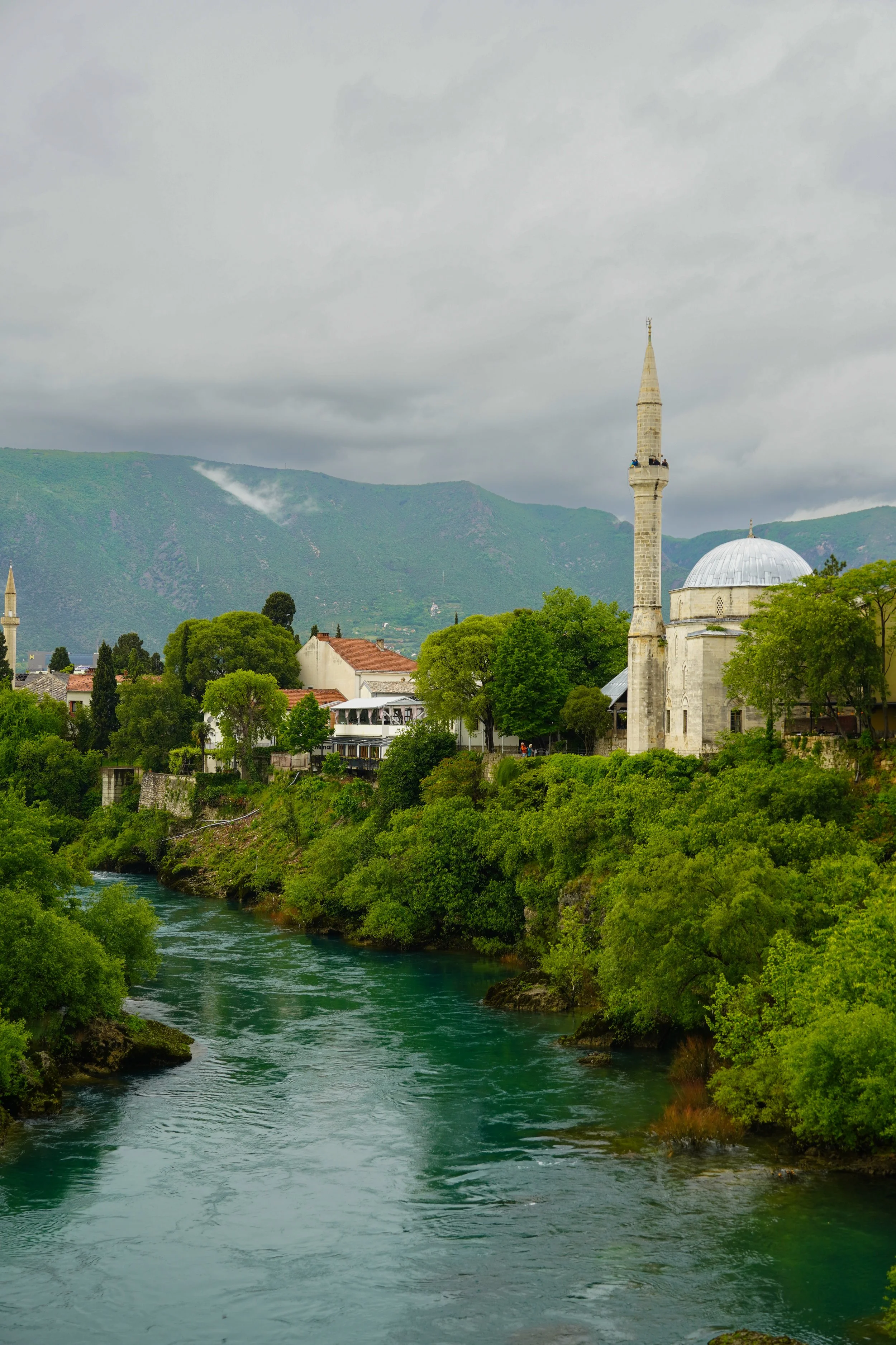 View of Koski Mehmed Pasha Mosque by the river Neretva in Mostar, Bosnia and Herzegovina