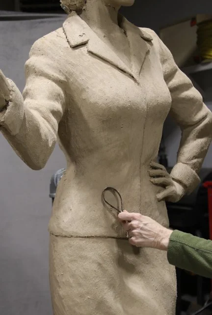 Applying clay to life size Fannie Mae Duncan Sculpture ©Lori Kiplinger Pandy