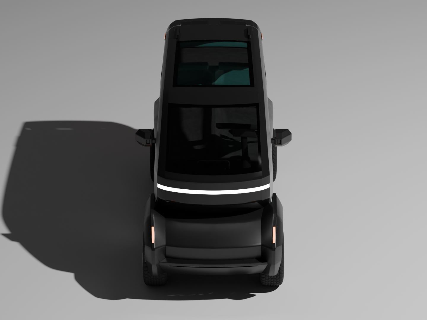 Top view of a black autonomous delivery vehicle with LED lights, casting a shadow on a neutral background.