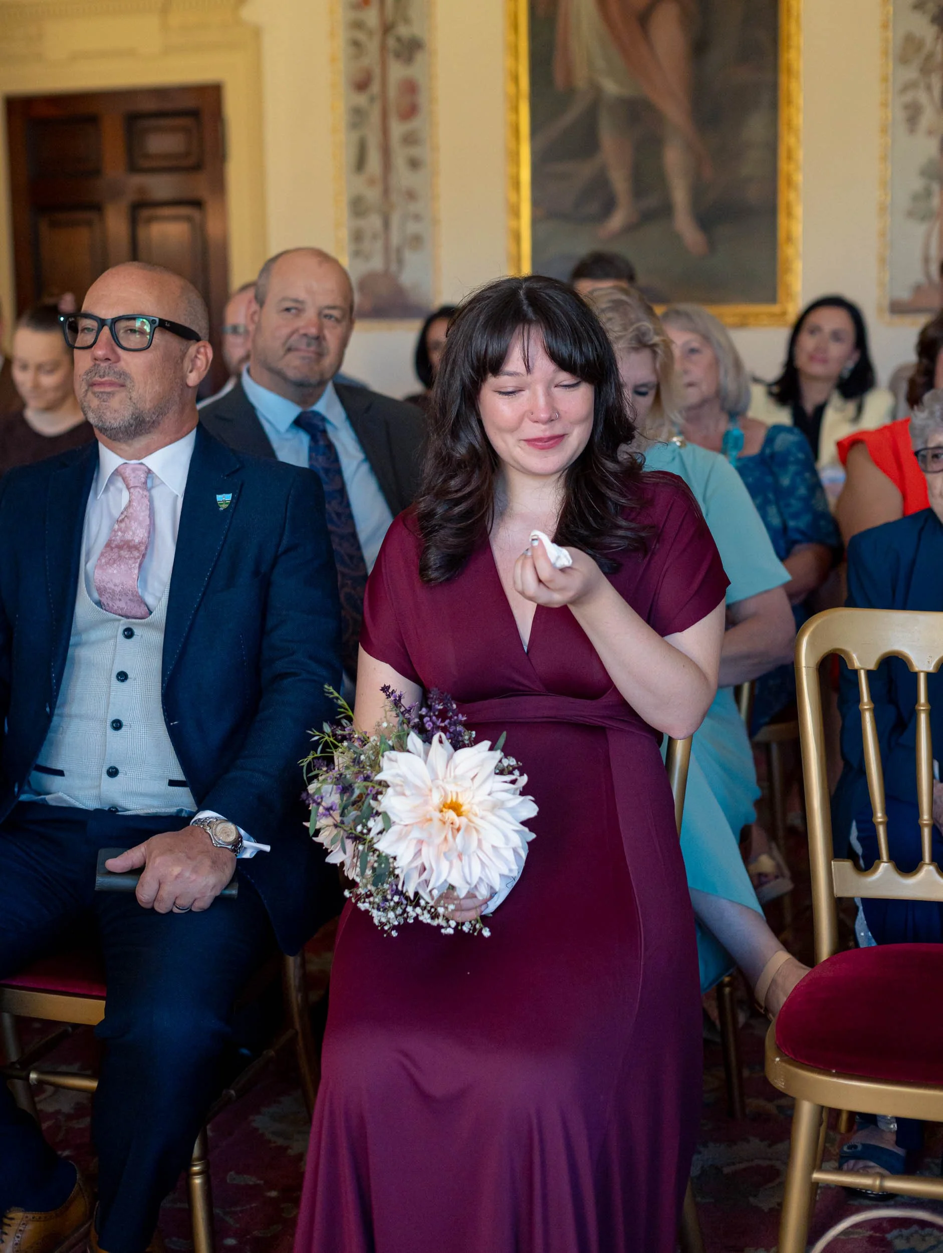 Bridesmaid crying during ceremony