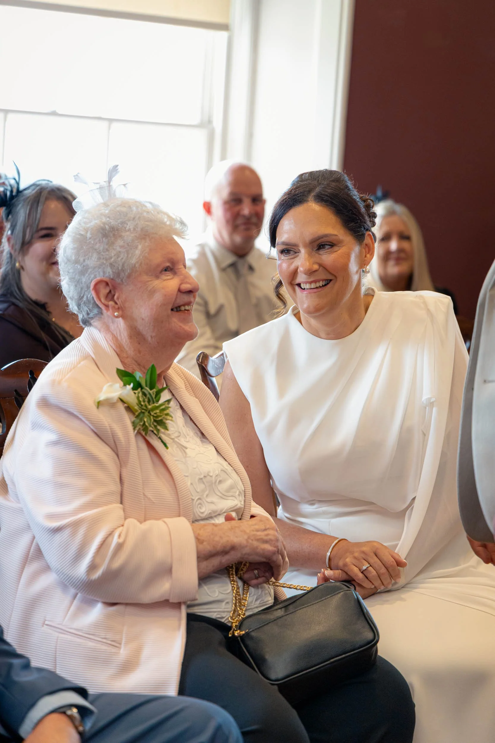 Mum and daughter laughing together