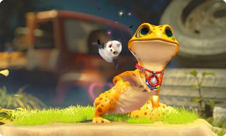 A computer-animated scene featuring a large, anthropomorphic tortoise with yellow and orange spots, wearing a red and blue necklace with a medallion. A small, white and black kitten-like creature with wings is flying nearby. The background shows a blurred truck and other outdoor elements.