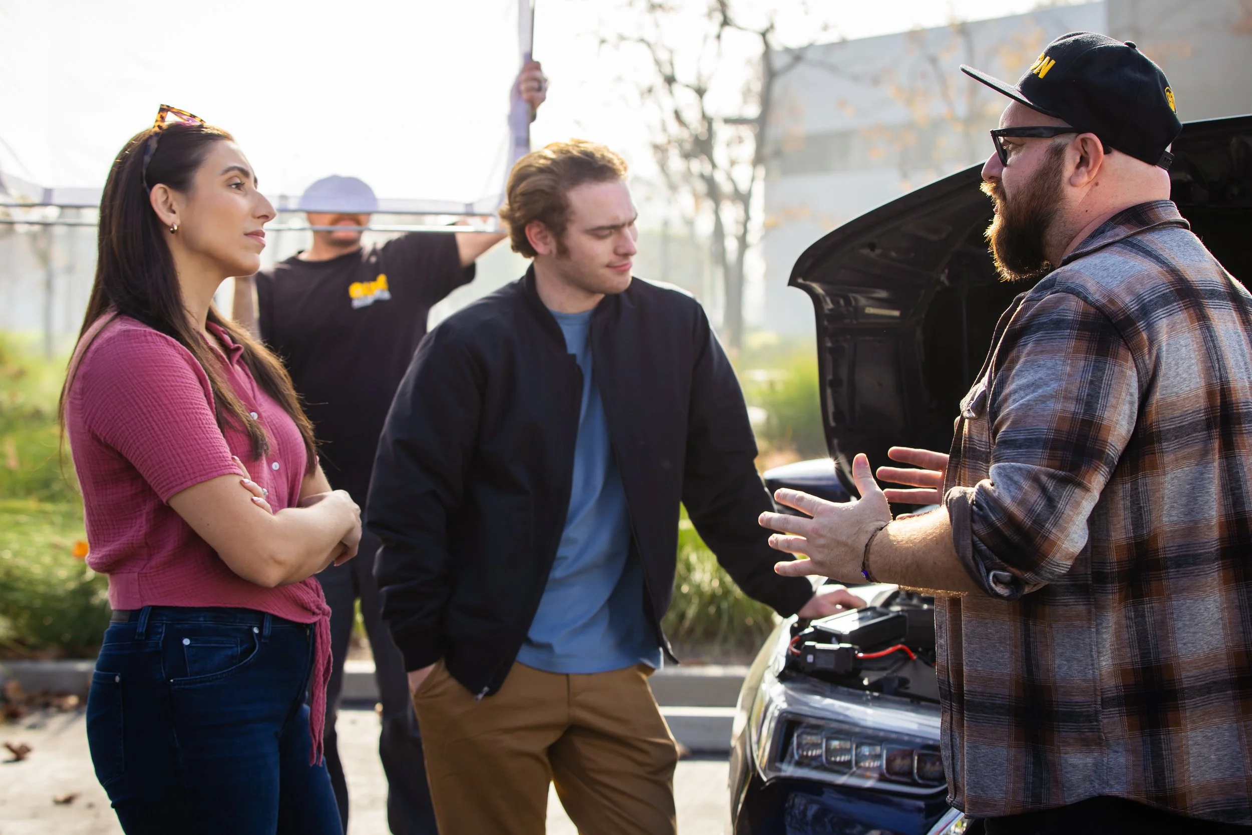 Director Dimitri Lazaris directs two actors on a recent commercial set.