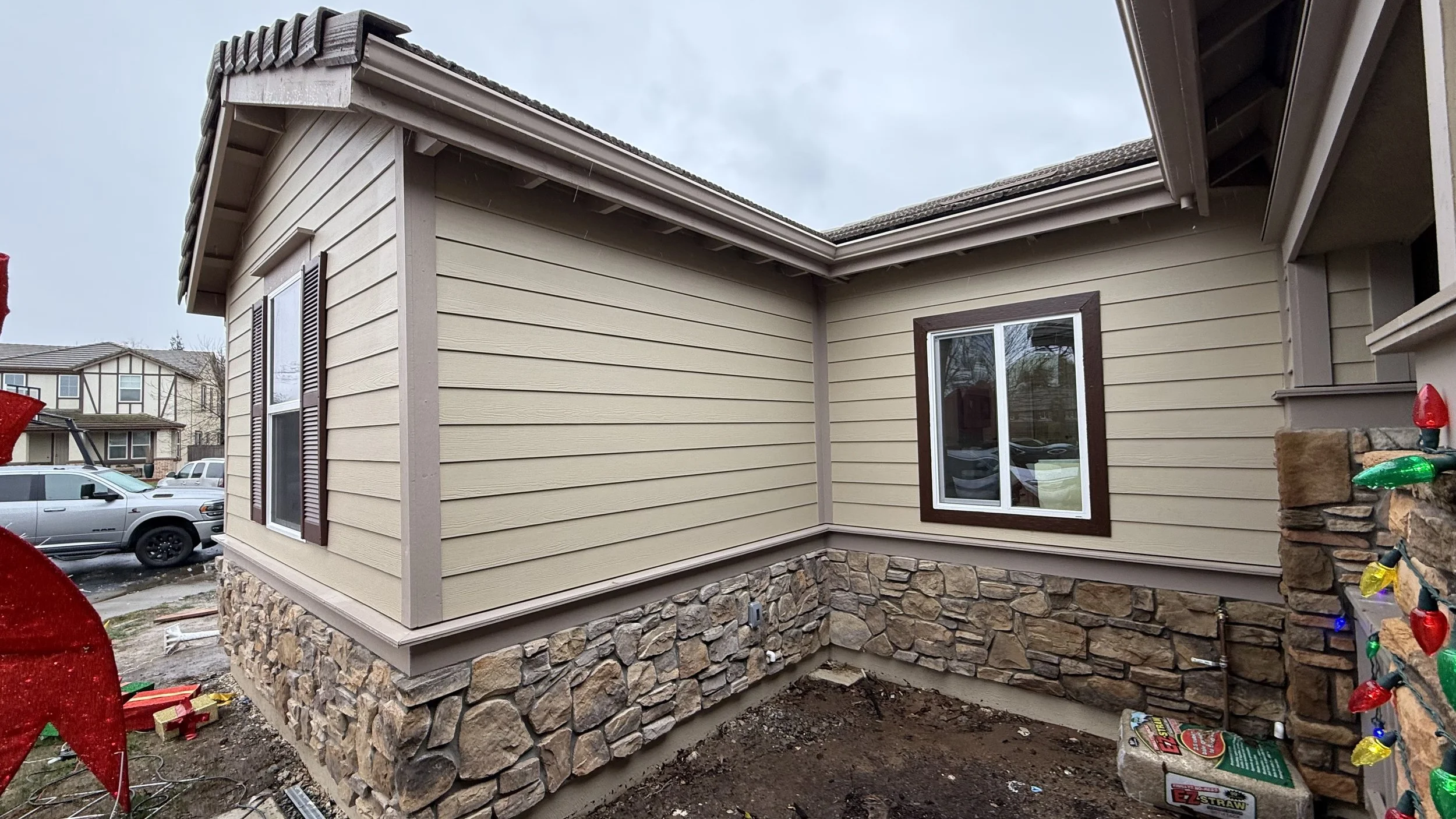 Lap Siding + Stone Veneer