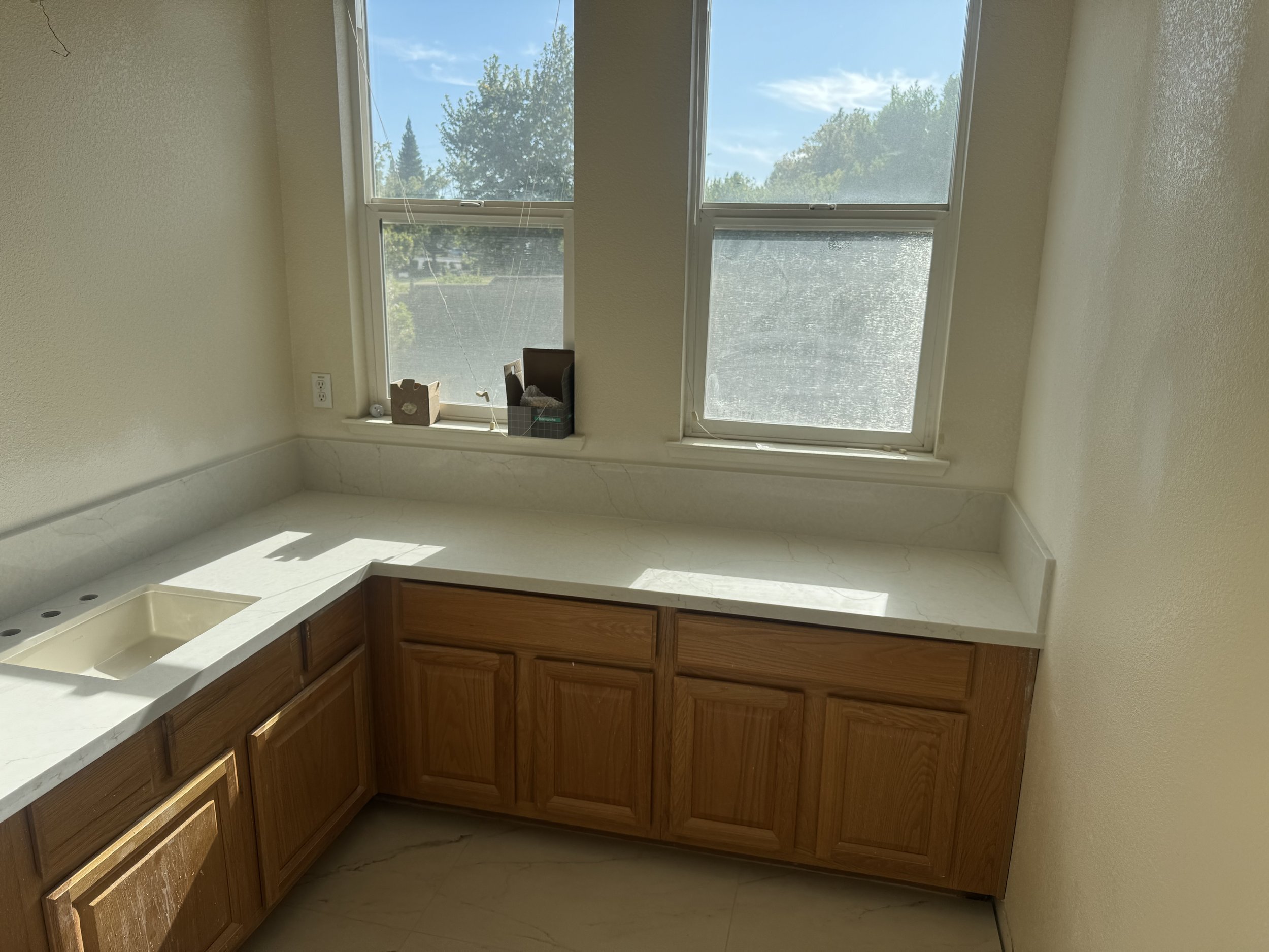 New Countertops & Ceramic Tile Flooring