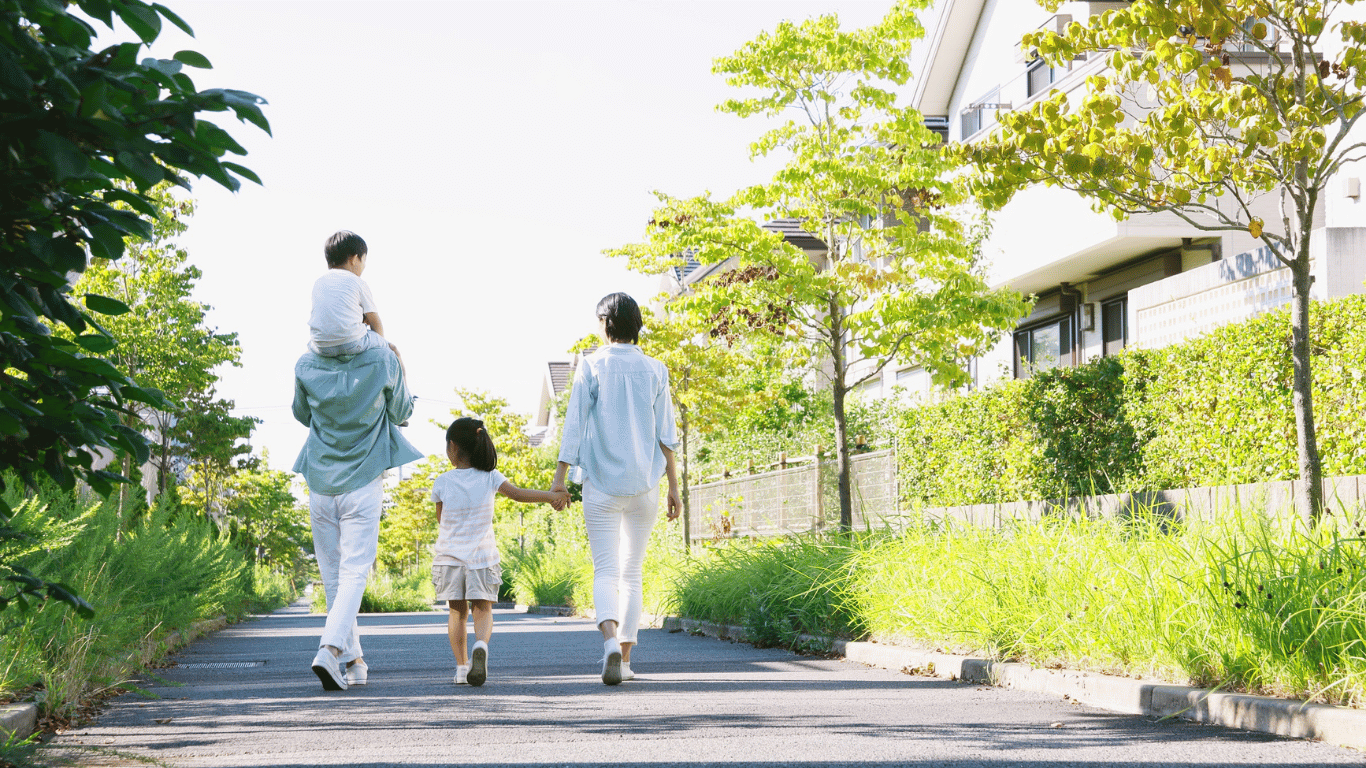multigenerational family walking through their neighborhood