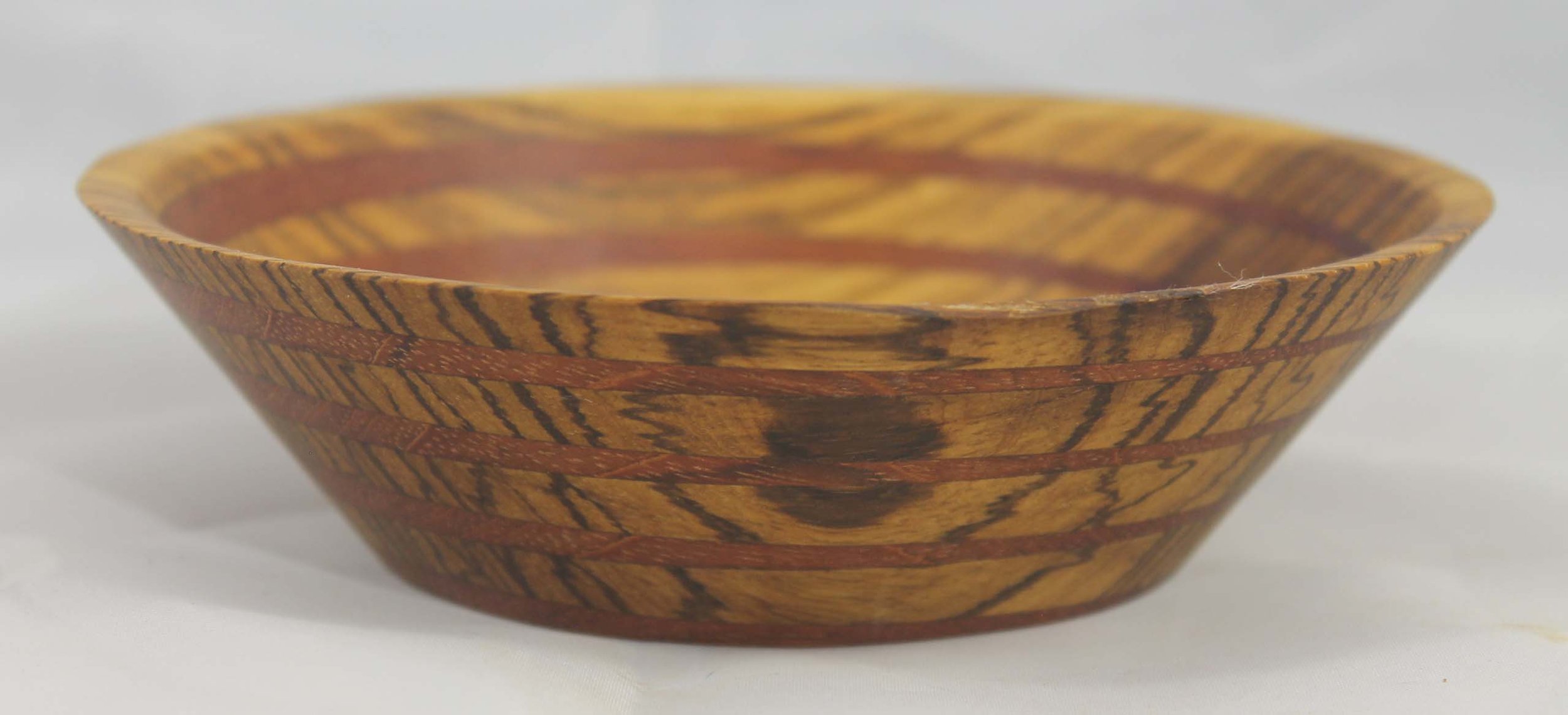 #6311 - Jatoba / Zebrawood Round Wedge Bowl
6” ɸ x 1 ¾” high
Finished with Danish Oil
$45