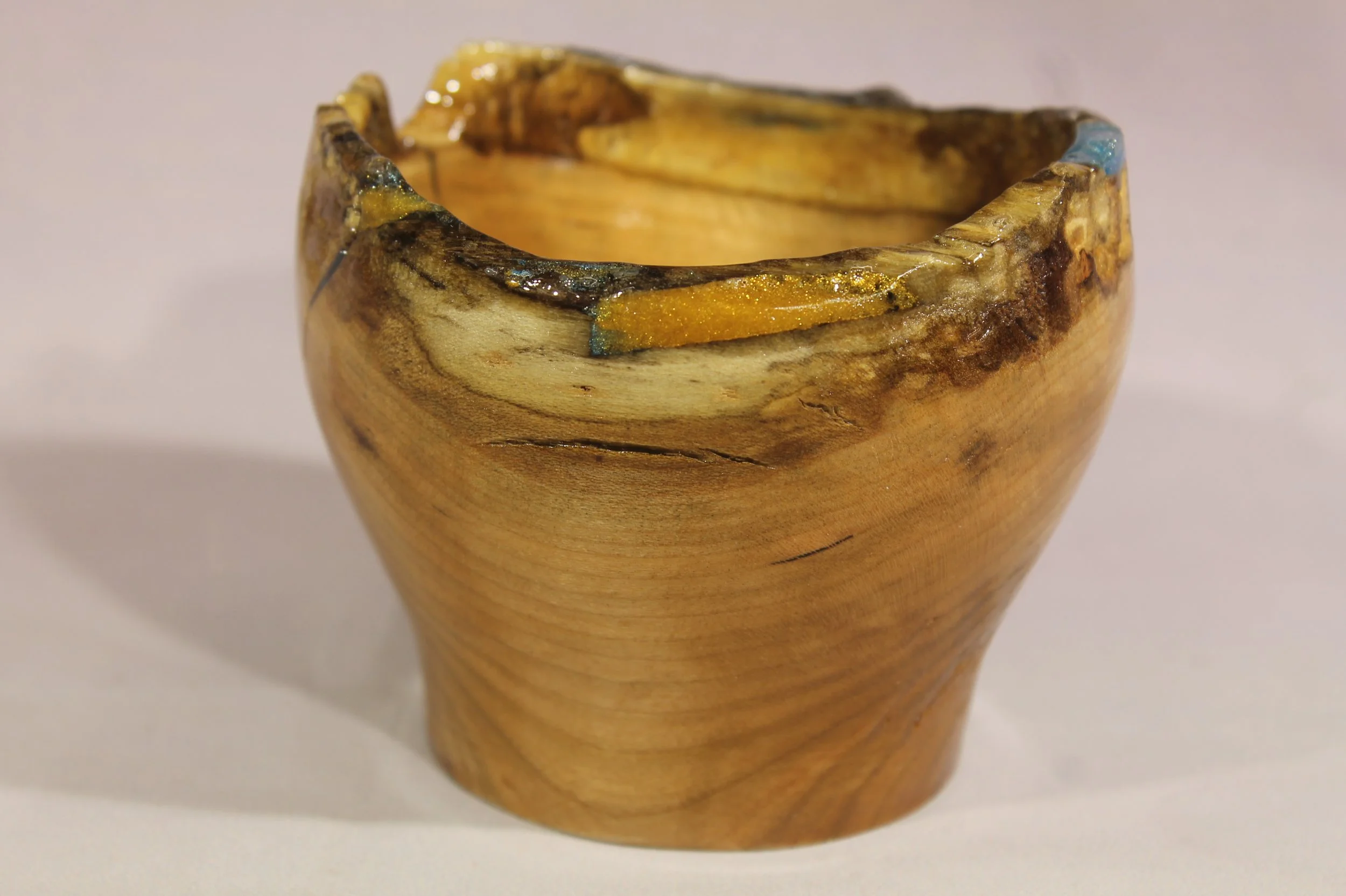 #6389 - Cherry Natural Edge Bowl
3 ¾” diameter by 3 ¼” high

Finished with gloss lacquer.            $40
