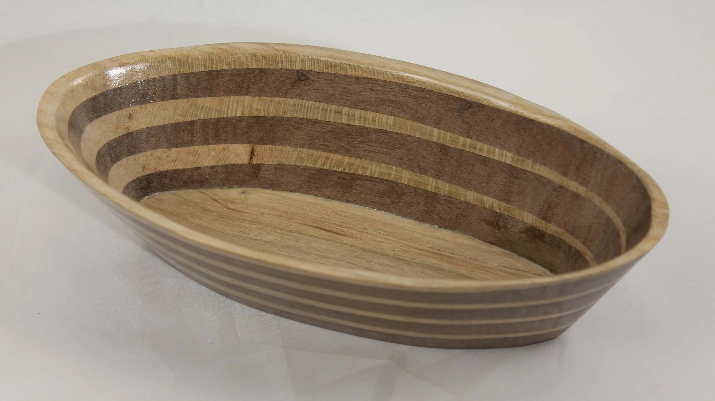 #6297  -  Cherry / Brazilian Walnut Wedge Oval Bowl

This is my signature wedge design with the lighter cherry contrasting with the Brazilian walnut.   The color and texture of this bowl is fantastic.
This bowl will draw attention no matter where you